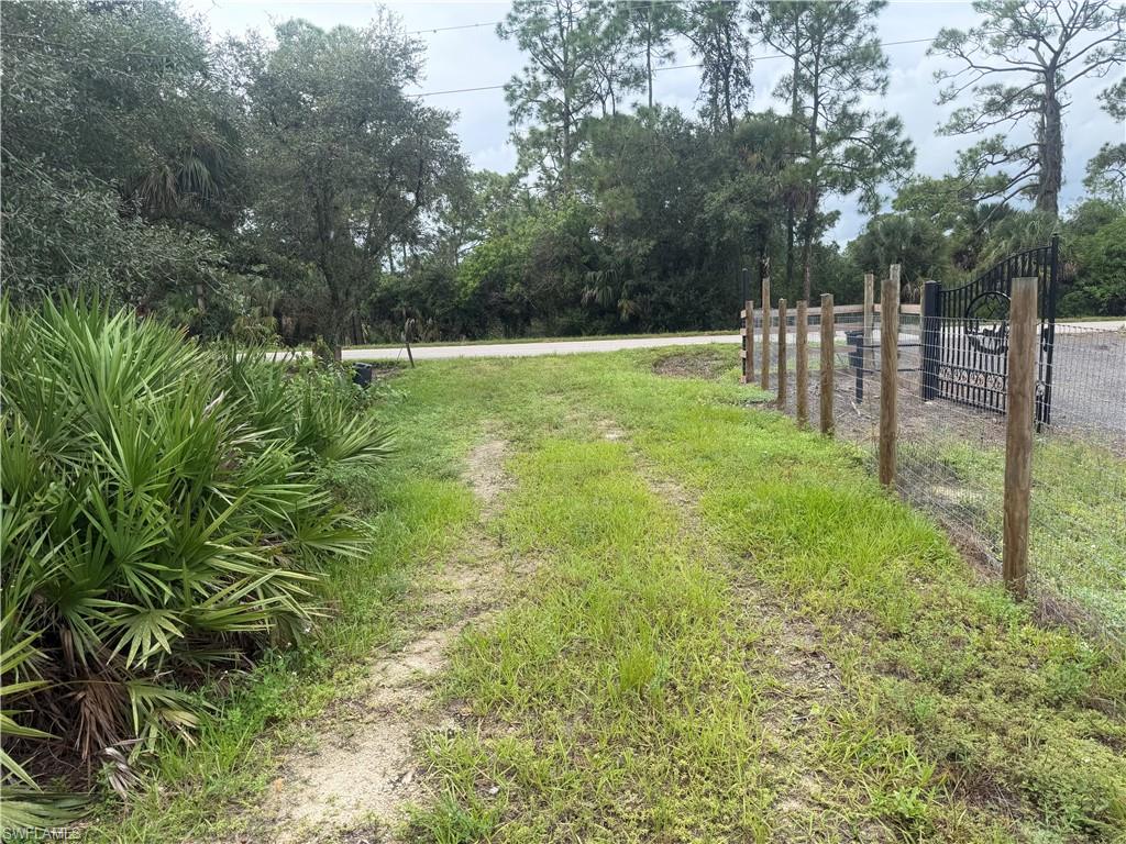 5 acres zoned A-2 with 2/1 manufactured home, multiple RV hook ups, pond, woods and paved road frontage. great for family outings, camping and most all out door activities.