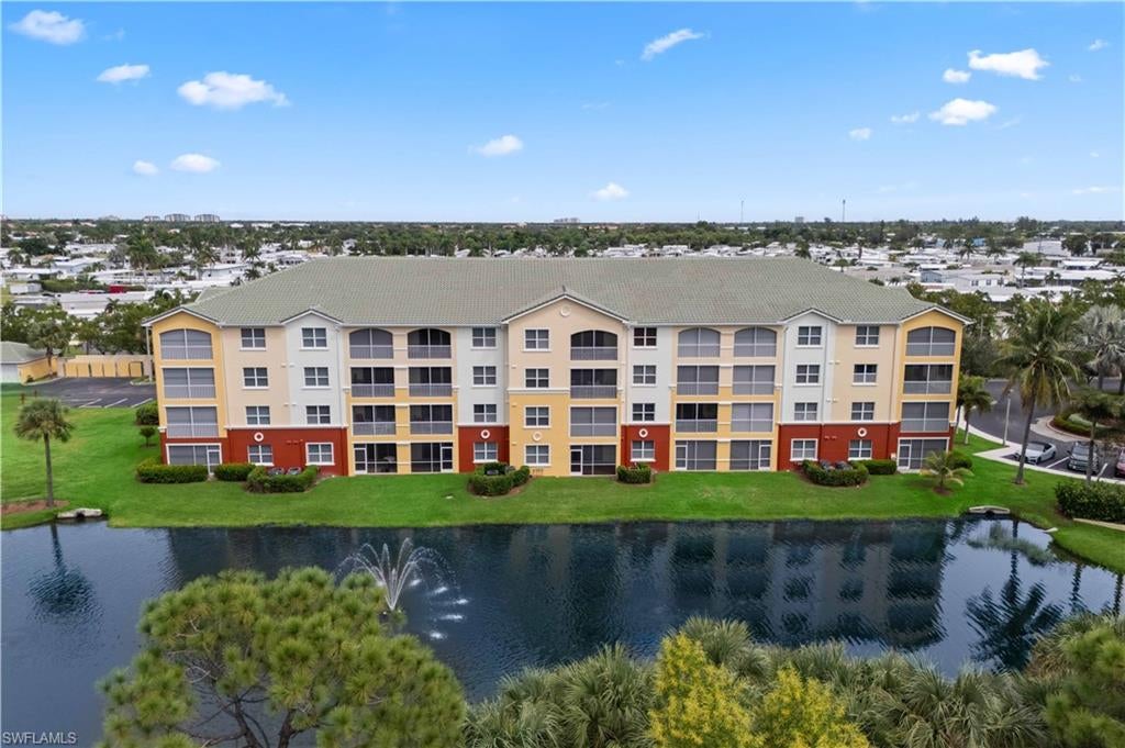 Experience the Best of Southwest Florida Living! This spacious 2-bedroom, 2-bathroom condo offers over 1,400 square feet of comfortable living space, ideally situated on the second floor. This home features natural light that fills the open floor plan, where lake views can be enjoyed from the living room, kitchen, and primary bedroom. The kitchen is designed for both function and style, featuring a breakfast nook, bar seating, and a seamless flow into the formal dining area and main living space. The primary suite is a true retreat, accessible through double doors, and includes direct access to the screened lanai, a large walk-in closet, and tranquil lake views. Offered fully furnished, this condo is move-in ready—just bring your toothbrush and start enjoying the Florida lifestyle. Located in the gated community of Gulf Reflections, you’ll enjoy peaceful lake views, beautifully maintained grounds, and a host of premium amenities. Gulf Reflections features resort-style living, including a heated pool, clubhouse with a fitness center, library, community room, and more. The building has been recently upgraded with a new roof (2023). Assigned covered parking is also included. Whether you're seeking a full-time residence, a seasonal escape, or a property with rental potential (with some restrictions), this home fits the bill. Pets are welcome (subject to community guidelines). Enjoy close proximity to world-class beaches, golf courses, fishing, boating, shopping, dining, and more. Plus, Fort Myers International Airport is only minutes away perfect for frequent travelers or guests. Don’t miss this opportunity to own a piece of paradise in one of Southwest Florida’s most desirable locations. Schedule your private showing today!