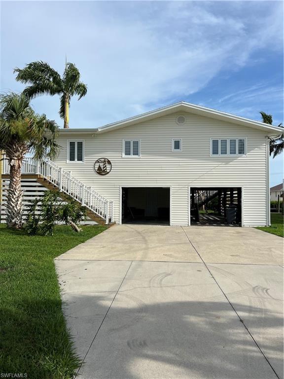 PRICE IMPROVEMENT! Live the Pine Island Waterfront Lifestyle! Escape to this beautifully remodeled gulf-access stilt home where every upgrade is already done and every day feels like vacation. This turnkey retreat blends modern comfort with the laid-back charm of island living—just bring your clothes and a toothbrush and start enjoying the water.
A Boater’s Paradise as you step outside onto your 2024 captain’s-walk dock, complete with a 13,000 lb. boat lift and a convenient fish cleaning station. Launch straight into Matlacha Pass with no bridges—just open water, world-class fishing, and endless boating adventures right from your backyard. Fresh, Modern, and Move-In Ready
Inside, the home shines with a full 2023 remodel to include:
New kitchen and appliances, new laminate flooring installed over an added ¾" plywood reinforcement for a solid floor. New roof, hot water heater, replumb, and updated electric panel.
Clean, bright spaces designed for comfort and easy coastal Island living at its best! Sip your morning coffee with the breeze on the balcony, spend afternoons on the water, and unwind with sunset views only Pine Island can offer. Whether you’re seeking a seasonal escape or a full-time waterfront lifestyle, this home delivers effortless living in one of Southwest Florida’s most peaceful boating communities.