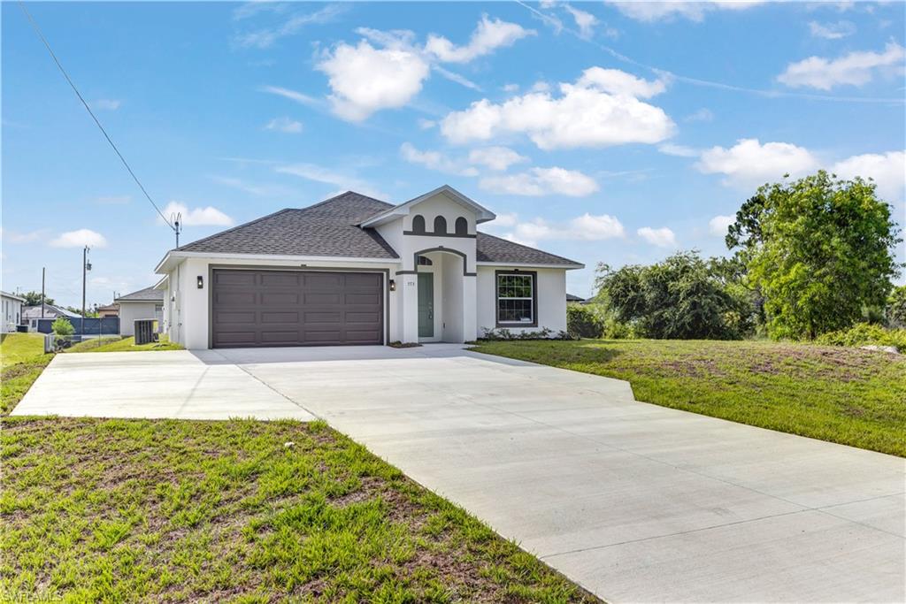 *Seller willing to contribute up to $6,298 towards buyer's closing costs.* Welcome to the Wyndsor Model — a stunning new construction home offering a modern open-concept layout with high-end finishes throughout. The spacious kitchen is designed for both style and function, featuring Samsung stainless steel appliances, quartz countertops, an oversized island, white shaker cabinets with 42" uppers, dovetail drawers, soft-close cabinetry, and a convenient dry bar area. Designer recessed LED lighting enhances the bright and inviting living spaces.

The home showcases designer tile flooring throughout, vaulted ceilings in the main living areas, and structured low-voltage wiring for data and cable. The primary suite offers a tray ceiling, spacious walk-in closet, and a beautifully appointed bathroom with dual vanities, Corian countertops, designer tile, and Moen fixtures. All bedrooms include LED lighting and ceiling fan pre-wiring.

Enjoy the Florida lifestyle on the large rear concrete patio, surrounded by professional landscaping and full Bahia sod. The property includes a private well system with water treatment installed prior to closing and an ATU septic system permitted for 4 bedrooms, with the septic located at the front of the home and a clear rear yard.

Additional highlights include hurricane storm shutters, vinyl insulated tilt-out windows, a two-car garage, and an oversized turnaround driveway. No HOA! Conveniently located near shopping, dining, and commercial areas.

Backed by a 2-10 Builder Warranty plus a 1-year bumper-to-bumper builder warranty for total peace of mind. This one checks every box — schedule your showing today!