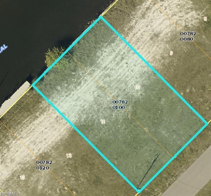 Imagine building your dream home on this exceptional 10,019 sq. ft. Gulf-access lot, already equipped with a seawall for effortless boat docking and unparalleled waterfront living. Nestled in a highly desirable, well-established neighborhood, this rare opportunity offers immediate access to the Gulf of Mexico, allowing you to enjoy the water in just minutes. Experience the best of coastal life with boating, dining by the water, boutique shopping, and endless outdoor activities—all within easy reach. This prime lot is your canvas to create a personal oasis in a vibrant and flourishing community. Seize this chance to turn your vision into reality and secure your waterfront paradise today!