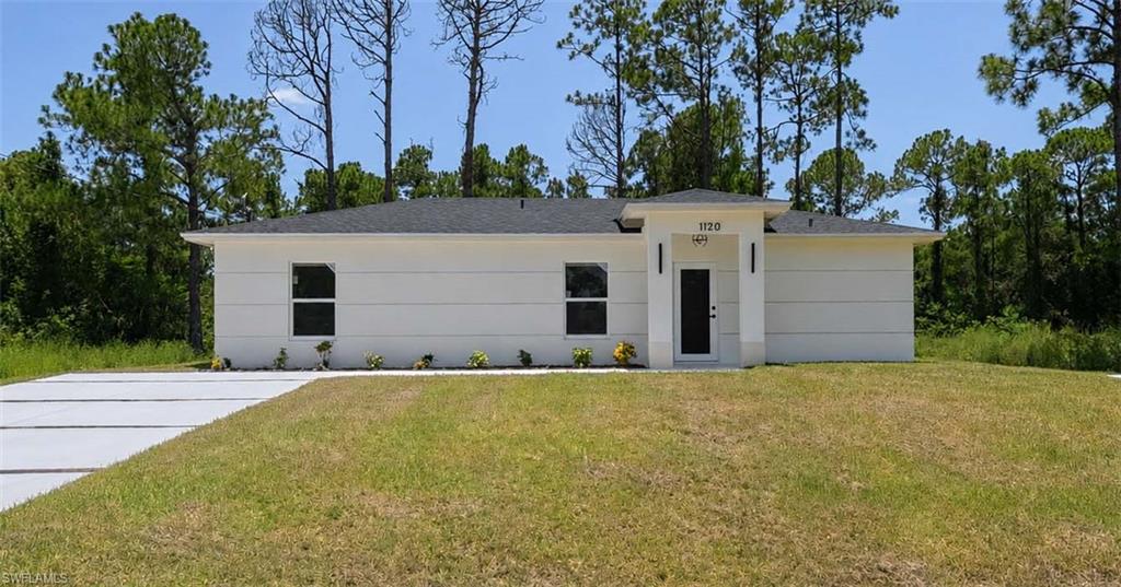 Move-In Ready! This home is a great option for Buyers looking for affordability and excellent value!! Welcome home to this beautifully crafted new construction located on the peaceful east side of Lehigh Acres, offering the perfect blend of modern style, comfort, and convenience. As you step inside, you're greeted by an open and inviting floor plan filled with natural light and elegant porcelain tile flooring that flows seamlessly throughout the entire home, creating a clean, modern look that's both stylish and easy to maintain. The heart of the home is the gorgeous kitchen, featuring sleek quartz countertops, stainless steel appliances, and plenty of workspace for preparing meals, entertaining guests, or simply enjoying everyday life. Whether you're hosting dinner parties, holiday gatherings, or casual get-togethers, this space is designed to bring everyone together. The spacious primary suite offers a peaceful retreat after a long day, complete with a generous walk-in closet and a beautifully designed en-suite bathroom featuring a modern walk-in shower. Two additional bedrooms provide the flexibility to accommodate guests, hobbies, or a home office. Step outside to the back patio, where you'll find the ideal space to enjoy your morning coffee, relax after a busy day, or host weekend barbecues or outdoor gatherings. Designed with comfort and convenience in mind, this home also includes washer and dryer hookups, and quality finishes throughout. Conveniently located with easy access to SR-82, you'll enjoy an easy commute while experiencing the peace and privacy of one of East Lehigh Acres' growing neighborhoods. This move-in ready home offers everything you need to start your next chapter from day one. Whether you're a first-time homebuyer, looking to upgrade, or searching for a brand-new home, this property delivers exceptional value, modern finishes, and a lifestyle you'll love. Don't miss the opportunity to make this beautiful new construction your own! Photos have been virtually staged using AI technology. Stainless Steel appliances in photos are AI rendered and are NOT the appliances being provided by the Seller.