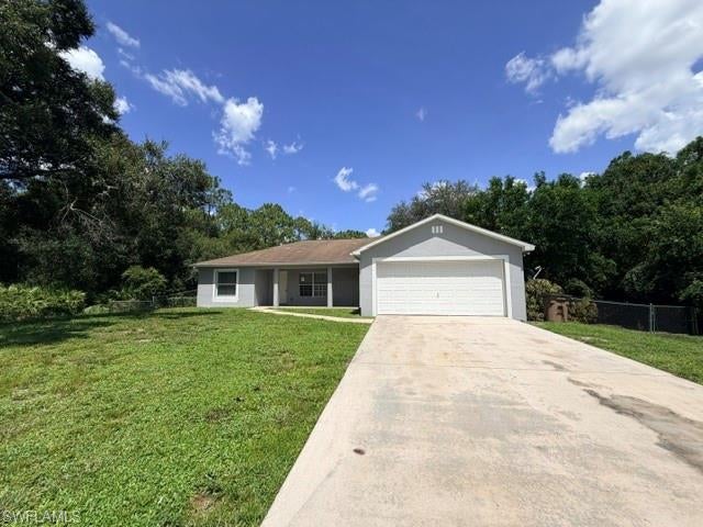 The half-acre lot features a fenced-in backyard, making it the perfect setting for this beautifully remodeled 3-bedroom, 2-bath home. The kitchen and bathrooms boast new cabinets and countertops, adding a modern touch to the space. The open floor plan creates a spacious feel, with the kitchen flowing into the family room, formal dining room, and eat-in kitchen. The laundry room, conveniently located off the kitchen, offers ample space for all your needs.

Step outside onto the oversized screened lanai, which spans almost the entire rear of the house and features newer screening. Double sliders off the main family area and primary bedroom provide easy access to this outdoor oasis. A new well water system has been installed, ensuring clean and fresh water for the home. Additionally, the A/C ducts and evaporator coil have been professionally cleaned, enhancing the efficiency of the home's cooling system.

If you appreciate serenity and a quiet neighborhood, this home is the perfect fit for you. Don't miss out on the opportunity to make this peaceful retreat your own.