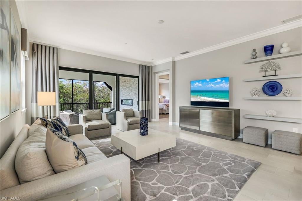 Professionally decorated by local award-winning Cardamon designs this Viansa “Terrace” condo located in Talis Park comes FULLY FURNISHED! A Penthouse 3rd floor unit has elevators that welcome you into your own private foyer. Breakfast bar and dining table seating. Natural gas cooking and built in fridge with separate dry bar with wine and beverage fridge. Upgrades include primary closet built out, rock wall with recessed fireplace on the screened in lanai. Southern exposure with private, tranquil preserve views. This residence comes included with your very own humidity controlled oversized private 2 car garage with custom designed built in organizational storage cabinetry. The Viansa sub-division in Talis Park is walking distance from the 5 Har-Tru Clay signature tennis courts, Pickle Ball and Bocce ball courts, grill, the lap pool, and tennis pro-shop. Restaurants, gym, and activities at the main clubhouse. Located in North Naples, Talis Park offers an award winning recently renovated golf course designed by Greg Norman and Pete Dye. Come enjoy complete maintenance free luxurious living!