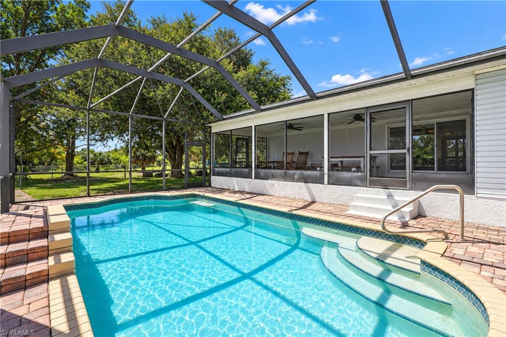 Welcome to your own private slice of country living! This meticulously cared-for 3-BEDROOM, 2-BATH HOME offers the space, privacy, and flexibility that are hard to find, all set on a FULLY FENCED 1-ACRE LOT at the END OF A QUIET DEAD-END STREET.
Inside, you’ll find a versatile DEN/FLEX/HOBBY ROOM that can easily adapt to your lifestyle. Step outside and enjoy year-round Florida living with a SCREENED-IN, BELOW-GROUND POOL, spacious OUTDOOR LIVING AREA, and BRAND-NEW DECK—ideal for relaxing, entertaining, or simply enjoying the peaceful surroundings.

The expansive property features MATURE TREES AND ESTABLISHED LANDSCAPING, MULTIPLE STORAGE SHEDS, a SEPARATE FENCED GARDEN, BASKETBALL HOOP, and PLAYGROUND. There’s also PLENTY OF ROOM FOR HORSES AND LIVESTOCK, gardening, recreation, hobbies, and additional outdoor projects.

The home offers several important updates, including a ROOF APPROXIMATELY 2 YEARS OLD, WELL PUMPS APPROXIMATELY 1 AND 2 YEARS OLD, AIR CONDITIONER APPROXIMATELY 5 YEARS OLD, and POOL PUMP APPROXIMATELY 4 YEARS OLD. The SEPTIC SYSTEM WAS PUMPED JUST A COUPLE OF MONTHS AGO. 

The pool is equipped with a POOL HEATER AND SALT SYSTEM, although BOTH ARE CURRENTLY NON-FUNCTIONING.

If you’re looking for PRIVACY, USABLE LAND, AND ABUNDANT OUTDOOR AMENITIES while still enjoying the comforts of a well-maintained home, this unique property is ready to impress. Come see everything this special property has to offer!