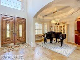 This beautiful, one-of-a-kind custom-built single-family home in The Enclave offers over 4,300 square feet of exceptional living space, featuring 4 bedrooms, 5 bathrooms, an office/den, and an impressive array of upgrades.

From the moment you arrive, the grand double-door entrance and circular driveway create a striking first impression. Inside, an open floor plan with soaring volume ceilings, elegant tile flooring, custom paintwork, crown molding, and a stunning wood-and-iron staircase showcase the home's sophisticated design.

The expansive gourmet kitchen is truly the heart of the home, featuring a gas cooktop, oversized center island, beautiful bar area, and a seamless glass window overlooking the outdoor living space. The first-floor primary suite provides privacy and comfort, while the formal living and dining rooms offer elegant spaces for entertaining. Additional highlights include fireplaces, hurricane-impact glass, plantation shutters, a wine cellar, and a spacious second-floor loft.

Step outside to an extraordinary screened-in lanai designed for the ultimate Florida lifestyle. Enjoy breathtaking panoramic views of the 14th hole of the Sabal Golf Course from the oversized outdoor living area, complete with a sparkling rock pool, waterfall spa, built-in outdoor grill, and ample space for relaxing or entertaining.

A three-car garage with epoxy flooring adds convenience and functionality, while the home's extensive custom details and designer finishes make it truly exceptional.

This spectacular residence combines luxury, comfort, privacy, and breathtaking views in one remarkable package. Schedule your private tour today and experience this exceptional home for yourself!
