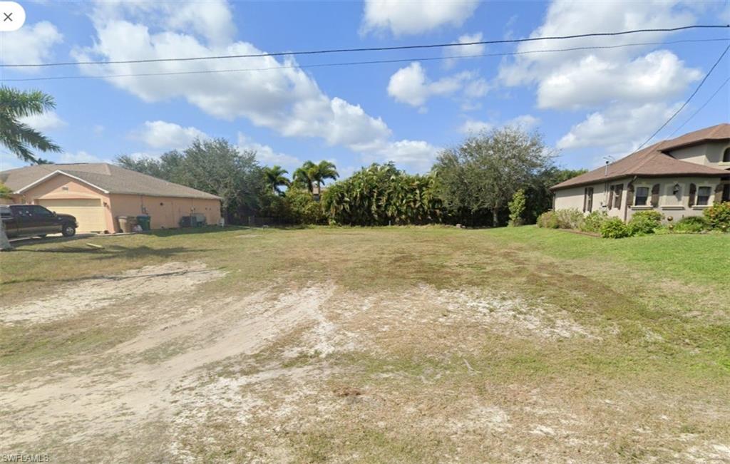 Solid .23-acre homesite ready to build on in the Palmetto Pine area of Cape Coral. Cleared, assessments paid, and sitting on a quiet residential street that still feels like a neighborhood instead of a construction zone.  
You’re close enough to the golf course for an easy round and just a few minutes from the shops and restaurants along Pine Island Road. Veterans Parkway and Burnt Store Road are right there when you need to get somewhere, but the street itself stays low-key. No HOA, public road, standard city utilities available.
Cape Coral keeps expanding, and lots like this in established pockets don’t sit around forever once people realize they can skip the waterfront premium and still live in a convenient part of town. Good spot for a custom home, a simple Florida ranch, or whatever fits your plans. Bring your builder and take a look today.