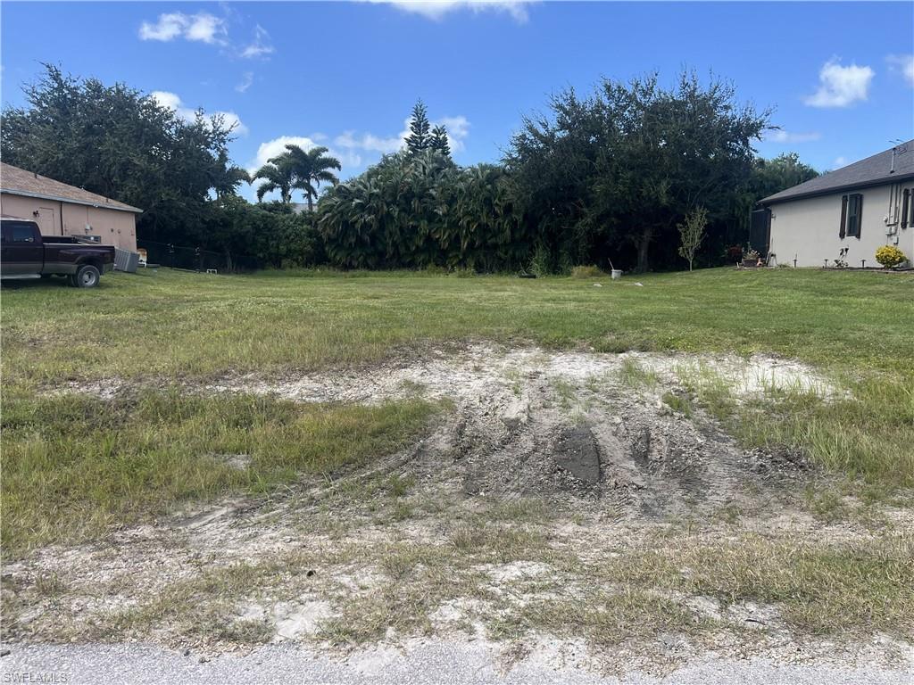 Solid .23-acre homesite ready to build on in the Palmetto Pine area of Cape Coral. Cleared, assessments paid, and sitting on a quiet residential street that still feels like a neighborhood instead of a construction zone.  
You’re close enough to the golf course for an easy round and just a few minutes from the shops and restaurants along Pine Island Road. Veterans Parkway and Burnt Store Road are right there when you need to get somewhere, but the street itself stays low-key. No HOA, public road, standard city utilities available.
Cape Coral keeps expanding, and lots like this in established pockets don’t sit around forever once people realize they can skip the waterfront premium and still live in a convenient part of town. Good spot for a custom home, a simple Florida ranch, or whatever fits your plans. Bring your builder and take a look today.