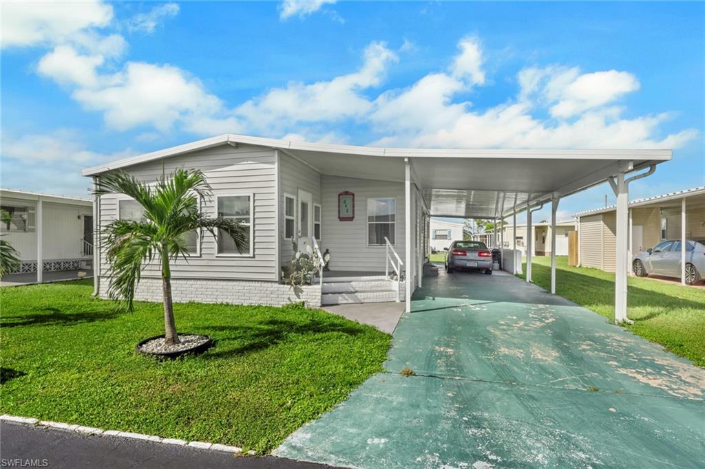 Move-in ready manufactured home in Lazy Days Village, a desirable 55+ community in North Fort Myers, Florida! This inviting 2-bedroom, 2-bathroom home offers comfortable living with a Florida room providing additional space to relax, entertain, or enjoy your morning coffee. New windows add an appealing update to the home. Residents of Lazy Days Village enjoy a variety of amenities designed for an active and social lifestyle, including a community swimming pool, pickleball, shuffleboard, and a bocce ball court. Conveniently located near shopping, restaurants, medical facilities, and local attractions, this home offers an excellent opportunity to enjoy the best of Southwest Florida living. Whether you're searching for a seasonal getaway or a year-round residence, this home is ready for you to make it your own! Don't miss your chance to enjoy affordable Florida living in an active  community. Schedule your private showing today and start planning your next chapter in the Sunshine State!