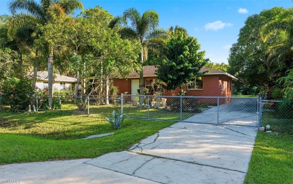 Discover the opportunity to make this property your next home! Conveniently located in well desired area of Immokalee, This home is a three bedroom with one and a half bath sits on .26 acres fenced in for your privacy, property has newer roof (2018) and ready for interested buyers. Whether you're looking for a place to call home or considering your next investment purchase, this could be it. Don't miss your opportunity.