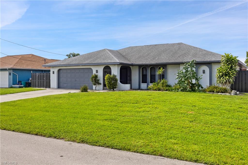 Welcome to this beautifully maintained 3-bedroom, 2-bath home offering the perfect blend of comfort, space, and Florida living. Situated just one block from Del Prado and Hancock, this property features an inviting open floor plan with abundant natural light, spacious living areas, and a well-appointed kitchen that flows seamlessly into the dining and family room—ideal for both everyday living and entertaining.

Step outside to your private backyard oasis featuring a screened patio with an outdoor kitchen, perfect for relaxing or hosting family and friends year-round. The property provides additional outdoor space while the attached 2-car garage offers plenty of room for vehicles and storage.

Enjoy the freedom of no HOA fees and the added benefit of no flood insurance currently required. Conveniently located close to shopping, dining, schools, medical facilities, and with easy access to Fort Myers, this home offers both tranquility and convenience.

Whether you're looking for a full-time residence, seasonal getaway, or investment opportunity, this move-in-ready home is one you won't want to miss. Schedule your private showing today!