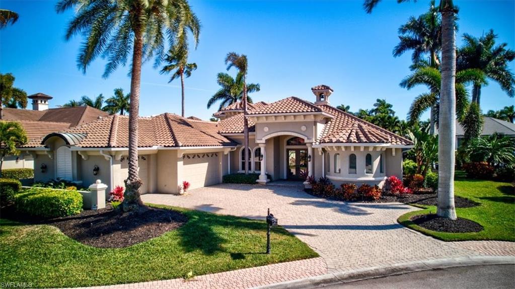 Experience luxury waterfront living at its finest in one of Cape Coral’s most prestigious gated yachting communities Cape Harbour. Perfectly positioned in Gate 3, this spectacular fully remodeled turnkey estate delivers exceptional design, upscale finishes, and the ultimate Florida lifestyle.From the moment you enter, the attention to detail is undeniable. This stunning two-story residence has been completely transformed with sophisticated designer furnishings, luxury vinyl plank flooring throughout, elegant lighting, fresh interior and exterior paint, oversized 9.25 inch baseboards, and expansive 90-degree impact sliders that seamlessly blend indoor and outdoor living.  The thoughtfully designed floor plan features 4 spacious bedrooms on the main level, including an impressive primary suite, 3 beautifully updated bathrooms, formal and casual dining spaces, and a chef-inspired kitchen equipped with quartz countertops, GE Profile stainless steel appliances, and a gas cooktop designed for entertaining.  Upstairs offers a private guest retreat or bonus living area complete with a 5th bedroom, 4th Bathroom, wet bar, and private balcony overlooking the resort-style pool and tranquil canal views. Step outside to your private tropical oasis featuring an expansive covered lanai, full outdoor summer kitchen, heated pool and spa, cascading waterfall feature, and lush mature landscaping creating the perfect setting for relaxation or entertaining.  For boating enthusiasts, this property is a dream come true with a wraparound dock and 20,000-pound boat lift providing quick access to open water.  Offered fully furnished and move-in ready, this exceptional waterfront residence combines elegance, comfort, and the coveted Southwest Florida boating lifestyle all in one extraordinary package.