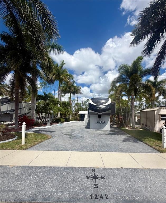 Offered at $295,000 with Fifth Wheel or $260,000 for RV Site Only

Enjoy privacy and tropical Florida living with this spacious RV site located in beautiful Silver Lakes RV & Golf Resort! Backing up to a peaceful preserve, this beautifully landscaped property features a decorative driveway, large Royal Palm trees providing shade, and a 10' x 18' screened lanai perfect for relaxing or entertaining. An attached 6' x 10' storage/laundry room includes a washer, dryer, refrigerator, and large tool cabinet.

Offered with or without the 2015 40' Montana Big Sky 3582RL fifth wheel. The fifth wheel features numerous upgrades, including new flooring, a new loveseat with electric recliners and massage features, LED lighting throughout, a newly sealed roof, and freshly painted kitchen, bathroom, and bedroom. Additional features include a premium three-chamber Select Air mattress and an under-sink reverse osmosis water system.

Two purchase options: $295,000 including the fifth wheel or $260,000 for the RV site only. A wonderful opportunity to enjoy the Southwest Florida lifestyle in Silver Lakes RV & Golf Resort!