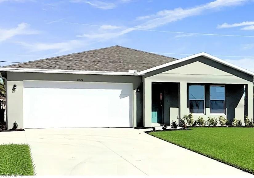 Discover Your Dream Home in the Cape Coral Classic Community! The Quincy Plan features an airy open layout with a seamless transition between the Living Room, a well-equipped Kitchen, and a separate Dining Area, ideal for entertaining. The kitchen stands out with its beautiful cabinetry, granite countertops, and stainless steel appliances, including a range with a microwave hood and dishwasher. The serene primary suite includes a private bath with dual vanity sinks and a generous walk-in closet. Additional highlights include a convenient two-car garage, energy-efficient Low-E insulated dual-pane vinyl windows, and a one-year limited home warranty. Select homesites provide additional privacy and showcasing mature pine trees, cabbage palms, and abundant wildlife—perfect for nature lovers seeking a peaceful retreat. Located near Charlotte Harbor Preserve State Park, Florida’s third-largest state park that includes shoreline, mangroves, and estuaries, homeowners enjoy easy access to kayaking, hiking, fishing, and birding.