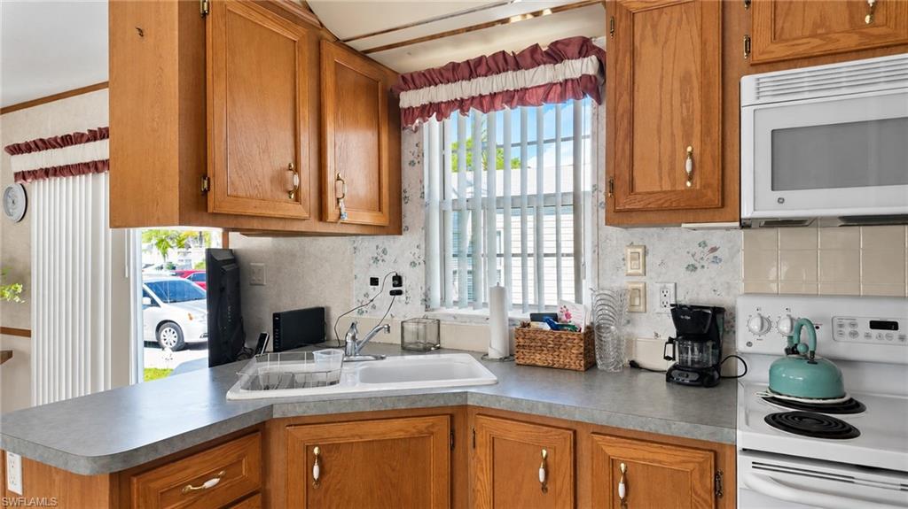 ISLAND CLUB AT CORKSCREW WOODLANDS - Residential