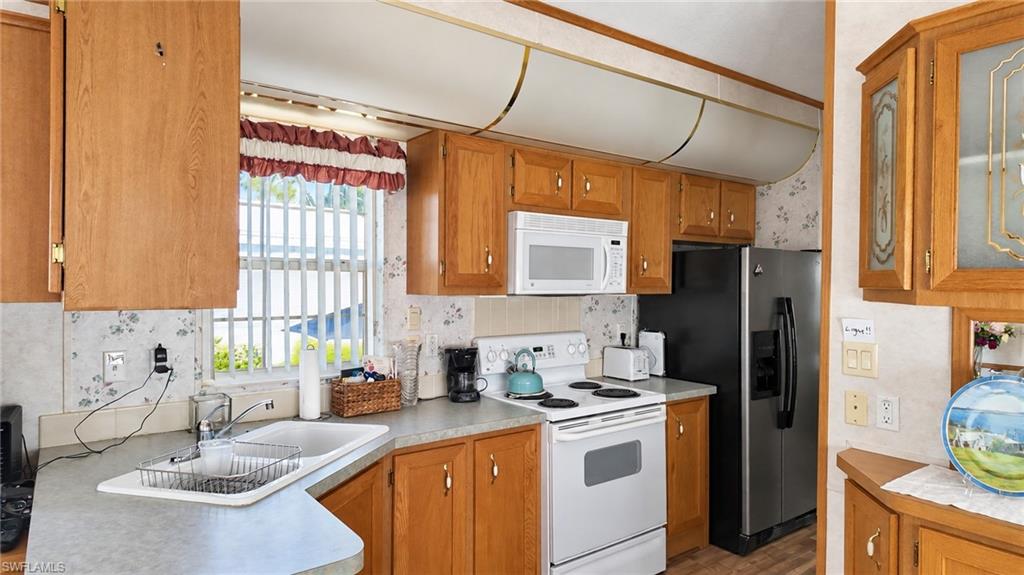 ISLAND CLUB AT CORKSCREW WOODLANDS - Residential