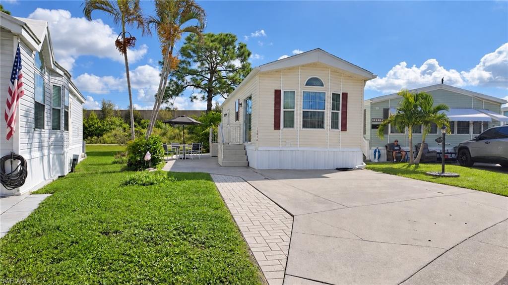 Welcome To Corkscrew Woodlands in Estero.

 The best of Florida awaits you! Park Model is looking for a new owner. 
Being offered Furnished, Turnkey. Dining, Living room combo floor plan. Large Master offers his and her closets, with tons of built ins for extra storage space. Queen Bed. Kitchen has a nice new Stainless side by side Refrigerator.  for your overnight guests.
Hardwood like laminate flooring throughout home. Parking for 2 cars in your driveway. Corkscrew Woodlands offers heated pool and spa, paddleboats on the lake, Library, pickle ball, Tennis, bocce, shuffleboard