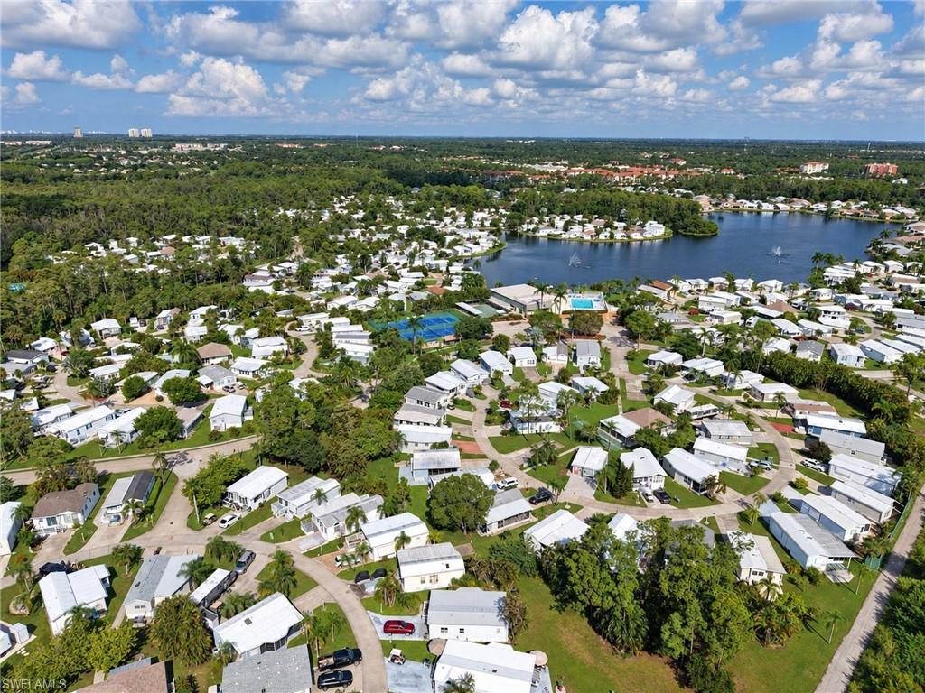 ISLAND CLUB AT CORKSCREW WOODLANDS - Residential