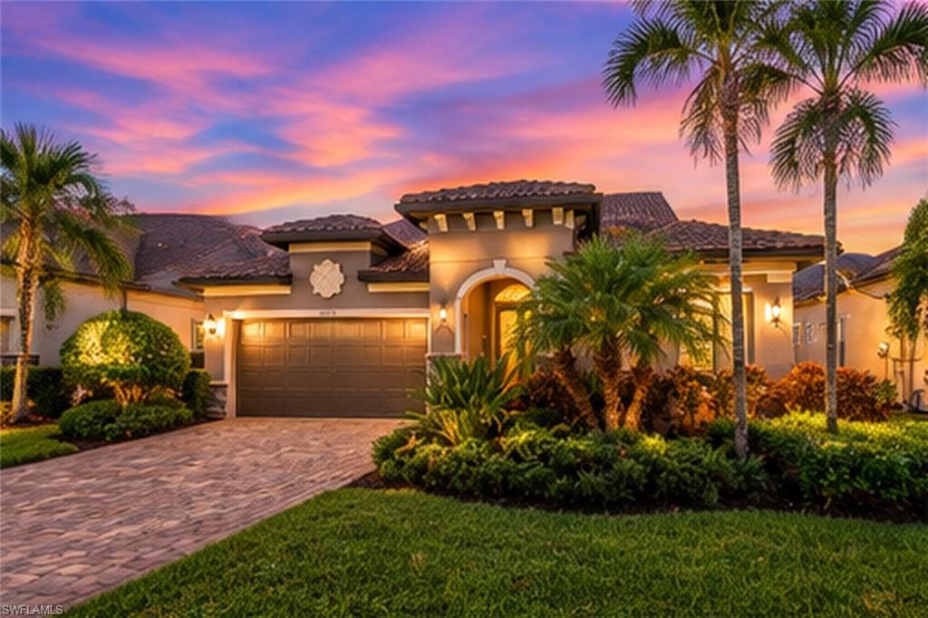 Long lake views, glowing sunsets, and your own heated saltwater pool and spa—welcome to 20558 Corkscrew Shores Boulevard. Located in the gated community of Corkscrew Shores, this thoughtfully upgraded Pulte Summerwood offers 3,077 square feet with 4 bedrooms, a den, 3 full bathrooms, and an upstairs loft, combining spacious gathering areas with private retreats.
The open main living area draws your eye toward the lake, creating an inviting backdrop for everyday living and entertaining. The kitchen features quartz countertops, upgraded KitchenAid appliances, and a generous island that connects seamlessly with the dining and living spaces. Crown molding, open concept, and custom closet built-ins add style and thoughtful functionality throughout.
The main-floor primary suite enjoys peaceful lake views, while the den provides flexible space for a home office or quiet retreat. Upstairs, a spacious loft, guest bedroom, and full bathroom create a comfortable setting for visitors, hobbies, or a separate lounge.
Step outside to the screened lanai, where the heated saltwater pool and spa overlook the lake. Enjoy morning coffee by the water, afternoons in the pool, and sunset evenings with friends, while grilling on the outdoor kitchen.
Corkscrew Shores offers a resort-style lifestyle with a lakefront pool, clubhouse, fitness center, tennis, pickleball, bocce, and on-site dining, all within convenient reach of Southwest Florida’s shopping, restaurants, beaches, and airport. A beautiful lakefront setting, versatile floor plan, and exceptional outdoor living make this home a standout opportunity in Estero. Seller-provided a pre-inspection report available in the MLS supplements.