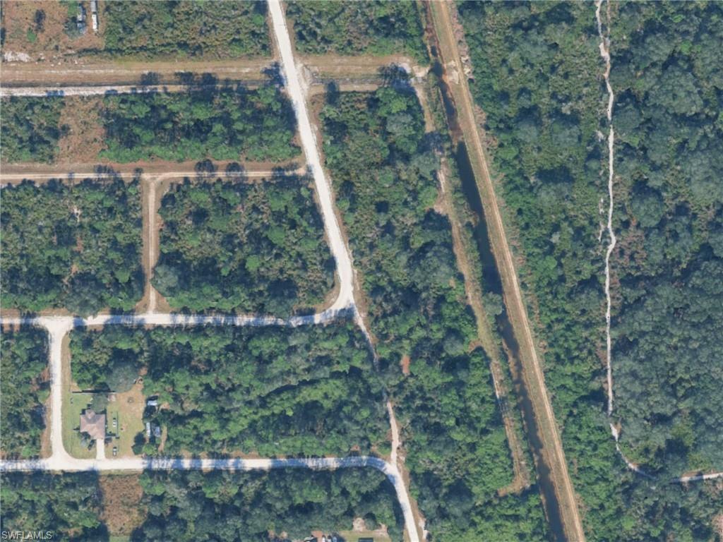 2604 Fitch Ave in Alva offers a rare opportunity to build your ideal home in a peaceful, scenic setting surrounded by the natural beauty this rural community is known for. The property provides generous space for a custom residence, additional structures, and outdoor living areas, all while maintaining privacy and a quiet atmosphere. Located near the Caloosahatchee River, local parks, and charming country roads, this homesite combines a relaxed lifestyle with convenient access to shopping, dining, and daily essentials in nearby Fort Myers. Whether you envision a private retreat, a family estate, or a future investment, this parcel offers the flexibility and potential to bring your vision to life.