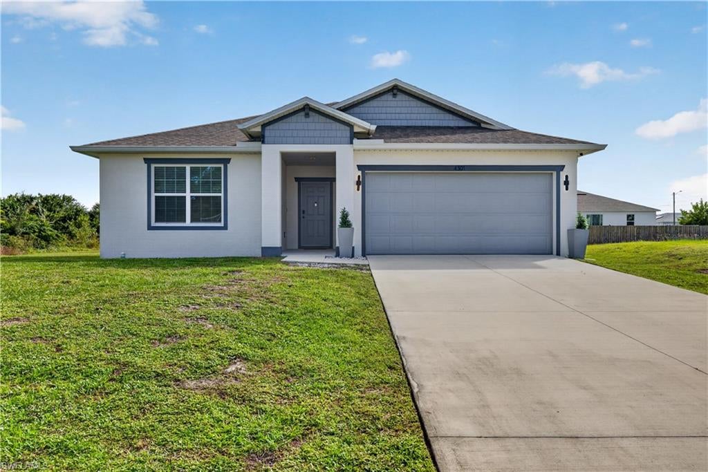 Discover this highly sought after floor plan that combines modern elegance, exceptional flexibility, and an incredible opportunity for multigenerational living! Built in 2022, this beautifully maintained, move in ready home offers 1,874 square feet of thoughtfully designed living space with 3 bedrooms and a unique private living suite that truly sets this home apart.
Perfect for extended family, guests, or those seeking a little extra privacy, the private suite features its own separate entrance, an efficiency kitchen, a spacious bedroom with a walk-in closet, and a full-size washer and dryer. Comfortable carpeting in the living spaces and luxury vinyl tile flooring in the efficiency kitchen complete this versatile retreat.
The inviting main living area showcases beautiful tile flooring, comfortable carpeting in the bedrooms, custom kitchen cabinetry, granite countertops, and a full suite of high-end Samsung appliances. Entertaining is a pleasure with a stylish built in bar featuring a commercial grade wine and beverage refrigerator. The bathrooms offer elegant quartz countertops, while the spacious primary suite provides a generous walk-in closet, dual vanities, and an oversized walk- in shower.
Step outside through the newly installed French doors and discover the possibilities of your expansive, inviting backyard! With a vacant lot behind the property, and corner oversized lot which provides additional privacy, this outdoor space offers a wonderful setting for relaxing, entertaining, or creating your very own tropical oasis. Imagine adding a sparkling pool, outdoor kitchen, or beautifully landscaped gathering space to enjoy the Southwest Florida lifestyle.
Additional features include storm shutters for all windows and French Door, a separate laundry room with full size Samsung Smart appliances, and the added benefit of being located in Flood Zone X.
Ideally situated near Highway 82 and Daniels Parkway, you'll enjoy convenient access to shopping, dining, entertainment, and Southwest Florida International Airport (RSW).
A rare combination of flexible living, contemporary finishes, and outdoor possibilities! Whether you're looking for room to accommodate guests, or simply enjoy a home designed for today's lifestyle, this property offers something special. Schedule your private showing and experience all this home has to offer!