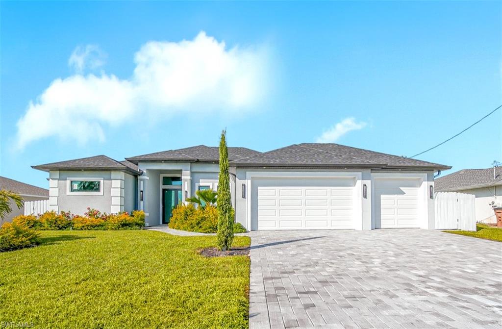 Beautiful 4 bedroom, 3 bath waterfront home located on the wide Hermosa Freshwater Canal in NW Cape Coral, offering approximately 140 feet of canal width and a desirable combination of space, comfort, and modern features.
The property is already connected to CITY WATER and offers NO HOA and NO FLOOD ZONE. Additional features include impact-resistant windows and doors, a fully fenced backyard, and a spacious 3-car garage.

The outdoor living area is designed for entertaining and everyday Florida living, featuring a private pool, outdoor shower, outdoor kitchen with built-in grill, and convenient access to a full pool bath.
The spacious primary suite includes a spa-inspired bathroom with a soaking tub, separate walk-in shower with dual shower heads, dual sinks, and generous closet space.

Interior features include a fireplace, dedicated coffee station with additional cabinetry in the dining area, and a well-appointed kitchen featuring a range hood and pot filler. Conveniently located near Tropicana Parkway and Nelson Road, with easy access to Farmer Joe’s, ALDI, Sun Splash Family Waterpark, shopping, dining, and other Cape Coral amenities.
A well-appointed waterfront property with desirable upgrades, generous living spaces, and freshwater canal views. Schedule your private showing today!