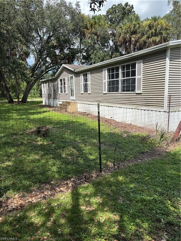 This 3\-bedroom, 2\-bath manufactured home offers approximately 1,678 square feet of living space and sits on almost 3 acres. The property provides ample outdoor space with plenty of room to enjoy the rural setting. Inside, the home features a functional floor plan with spacious living areas, a primary bedroom with private bath, central air conditioning and heating, and plenty of potential to make the property your own piece of paradise. Conveniently located with access to City of Clewiston and surrounding areas. If you're ready for a rural setting. This home is for you.