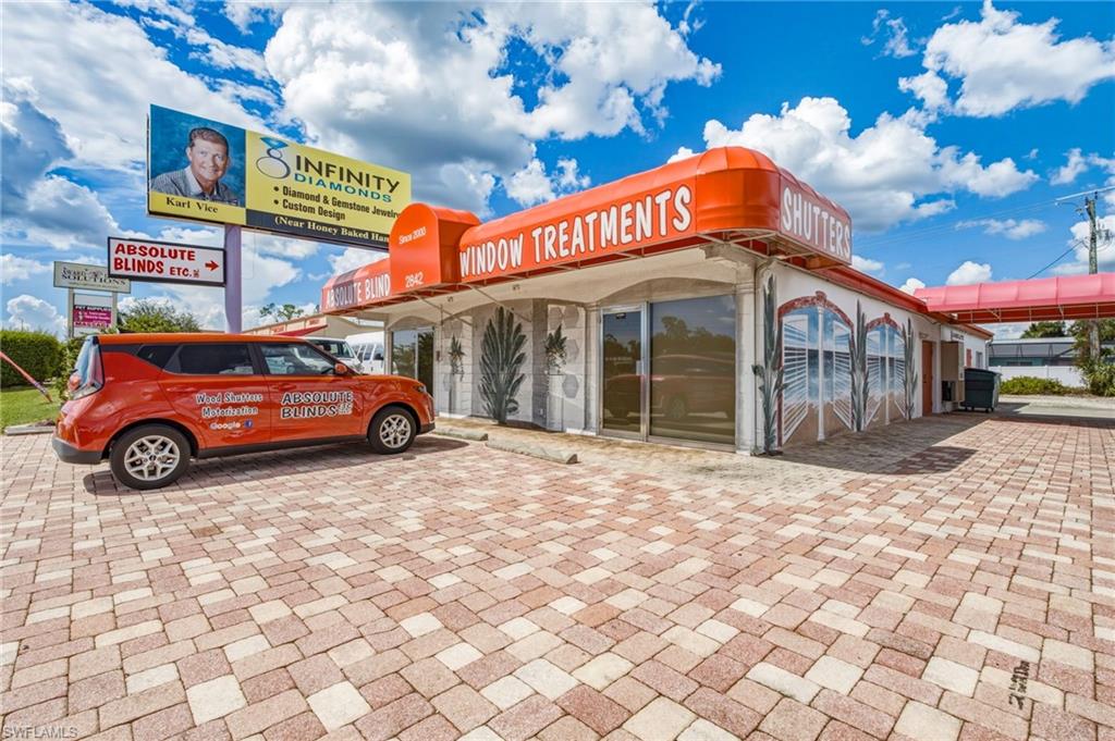 This prime commercial opportunity on busy Tamiami Trail catches the eye with exceptional visibility. Featuring a freestanding 2,625 sq.ft. building with 2,520 sq.ft. of finished space positioned directly on US-41 with an impressive 55,000 AADT, the commercial real estate is being offered at $450,000. The building has been recently updated with improvements to the roof, A/C, electrical, plumbing, and exterior awnings, and carries an effective age of 1990 per Charlotte County due to these extensive updates. With a showroom-style layout, the property includes two pre-existing bathrooms along with generous storage and utility space. The dual front entry setup allows for an easy conversion into a two-unit plaza with the addition of a simple dividing wall. Zoned Commercial General (CG), the building supports a wide range of commercial uses and offers strong adaptability for future growth. The brick-paved parking area enhances curb appeal and provides convenient customer access, while the high-visibility frontage makes this an ideal location. Surrounded by major retailers, restaurants, and established businesses in the heart of Port Charlotte’s commercial corridor, this property offers outstanding potential for both owner-users and investors seeking a versatile, high-exposure asset in a rapidly growing market. The commercial real estate is being offered for sale at $450,000. In addition to the real estate, the business assets, personal property, goodwill, inventory, equipment, and both company vehicles are being offered at $400,000, providing a rare opportunity to acquire a well-established window treatment business specializing in decorative window shutters and custom blinds. Founded in 2000 and well known throughout the local community, the business carries a long-standing reputation for quality craftsmanship and personalized service, making this package an attractive turnkey option for a buyer seeking an established operation with deep regional roots. The company provides a full line of premium blinds and shades from nationally recognized brands, along with locally manufactured, furniture-grade hardwood plantation shutters known for superior craftsmanship and durability. With three generations of expertise and a reputation for personalized service and professional installation, the business is widely regarded as one of Southwest Florida’s leading window-treatment providers.