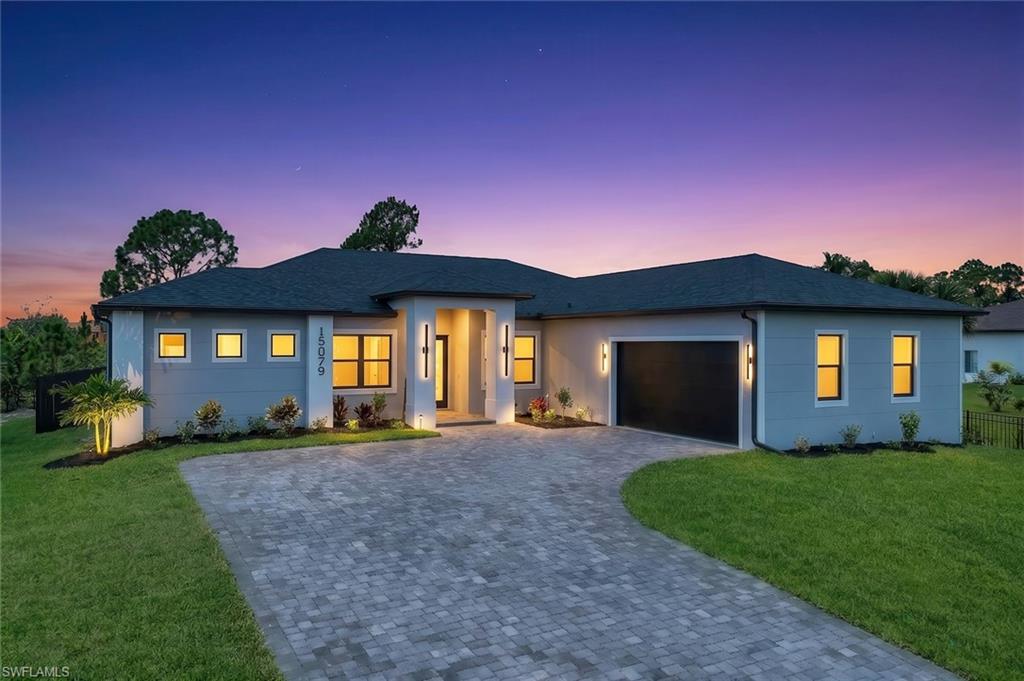 This custom-built 4-bedroom, 3-bathroom home in the desirable South Gulf Cove community offers 2,277 square feet of thoughtfully designed living space with quality finishes throughout. The open-concept floor plan is ideal for both everyday living and entertaining, featuring tile flooring throughout, impact-resistant windows and doors, and an abundance of natural light.
The custom kitchen showcases beautiful cabinetry, a built-in microwave, shiplap accents on the island, and generous cabinet and counter space. A built-in bar area adds both style and functionality, creating the perfect space for entertaining family and friends.
The spacious primary suite offers a private retreat with a spa-inspired bathroom featuring dual vanities, a soaking tub, and a walk-in shower with multiple shower heads. One of the guest bedrooms features its own en-suite bathroom with direct access to the pool, making it ideal for guests or multi-generational living.
Step outside to enjoy your private pool, built-in outdoor BBQ area, and fully fenced backyard, providing the perfect setting for relaxing, entertaining, or enjoying Southwest Florida's year-round sunshine. The side-load garage enhances the home's curb appeal while providing additional parking and storage.
Located in the waterfront community of South Gulf Cove, residents enjoy nearby parks, sidewalks, public boat ramps, and convenient access to shopping, dining, golf, beaches, and everything Southwest Florida has to offer.