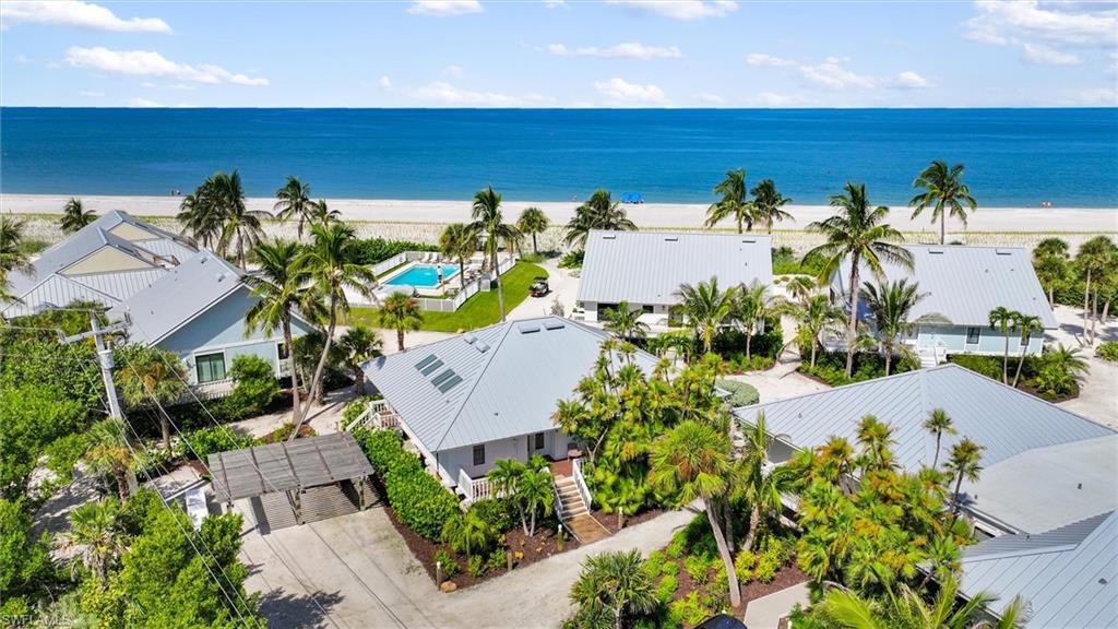 A rare opportunity to own a classic three-bedroom beach home in South Seas Resort, perfectly positioned to capture sweeping views of the Gulf beach, pool and Captiva's spectacular nightly sunsets. Wake up to views of the beach from the primary bedroom, gather with family and friends in the vaulted living room, and end the day on the spacious screened lanai as another unforgettable Captiva sunset unfolds directly in front of you. The inviting three-bedroom, two-bath floor plan offers comfortable island living with a full kitchen, vaulted ceilings, beach views from the living spaces and primary bedroom, and a generous, screened lanai overlooking the pool and Gulf shoreline. The home is wonderfully suited for relaxed family vacations, entertaining friends or enjoying as a personal island retreat while offering the potential for rental income when you're away. A new 2026 roof adds important peace of mind, while the home's classic character leaves an opportunity for its next owner to update and personalize the interiors to reflect their own vision of Captiva living. And then there is South Seas. Ownership places you within one of Captiva Island's most celebrated resort environments, with access to Club Captiva amenities including the resort's pools and water features, golf at The Clutch, fitness center, waterfront dining, beach services, water sports and the family-friendly adventures of Captiva Landing. But perhaps the greatest amenity is the one that cannot be recreated: your front-row seat to the Gulf of Mexico. Imagine morning coffee on the screened lanai, barefoot walks along the beach, afternoons at the pool, family dinners and evenings gathered together as the sun sinks into the Gulf. Priced to sell and ready for its next chapter, this is an exceptional opportunity to own a piece of Captiva's most treasured beachfront lifestyle. Come see the home. Stay for the sunset.