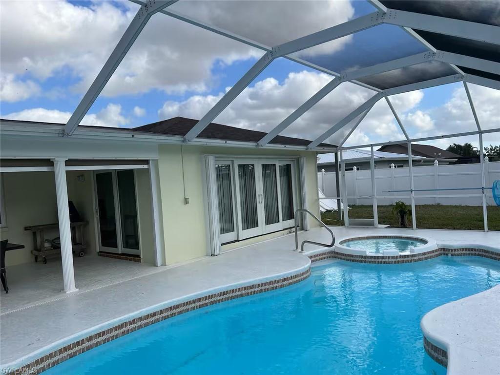 Move-In Ready Pool Home & Income-Producing Short-Term Rental in Desirable Palaco Grande!

Enjoy the best of Southwest Florida living in this beautifully updated 3-bedroom, 2-bathroom pool home, situated on an oversized corner lot in the sought-after Palaco Grande neighborhood of Cape Coral. Offering over 1,700 square feet of living area and a 2-car garage, this property is ideal for year-round living, a seasonal retreat, or an income-producing investment. Currently operating as a short-term rental and generating income, it offers an appealing opportunity for buyers seeking a property with existing rental activity.

The recently remodeled kitchen features wood cabinetry, newer stainless steel appliances, generous cabinet and counter space, and two breakfast bars, creating a welcoming space for everyday living and entertaining. New vinyl flooring in the bedrooms adds a fresh, updated touch. The spacious owner's suite features a walk-in closet and an updated bathroom with a subway-tile shower and a new seamless glass shower door.

Step outside and enjoy the Florida lifestyle in your own private backyard retreat! The expansive outdoor living area features a heated pool and spa, a covered patio, and a fully fenced yard with a 6-foot white privacy fence—ideal for relaxing, entertaining, and enjoying outdoor living.

Major updates include air conditioning replaced in 2021, an electrical panel updated in 2016, plumbing repiped in 2015, and a New Roof in 2022.

Located in the established Palaco Grande neighborhood, this home offers convenient access to Downtown Cape Coral, Jaycee Park, the Yacht Club area, shopping, dining, beautiful beaches, and world-class fishing. RSW International Airport and Punta Gorda Airport are also within reach.