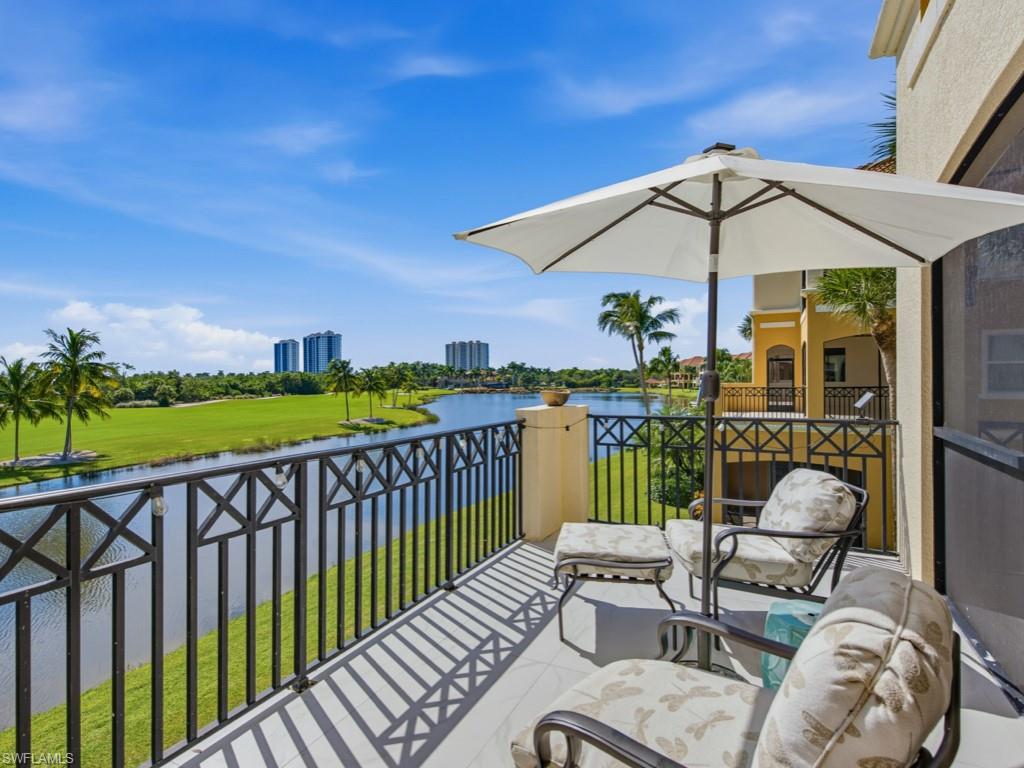 JW GOLF FULL MEMBERSHIP transfers with this exceptional property!  Enjoy outstanding golf course and water views from this gorgeous 3 bedroom, 2 and a half bath Borghese residence at the highly desirable Hammock Bay Golf and Country Club Community.  The private entry foyer leads to a stunningly renovated coastal masterpiece!  The formal living and dining room enter onto an enclosed terrace where you can unwind with magnificent sunset views.  The workable open concept kitchen offers stainless appliances, built in oven and microwave, induction cooktop, quartz countertops, abundant custom cabinetry, and large breakfast bar.  The separate great-room with private terrace is more than enough for additional living space. The master bedroom suite is its own private retreat featuring a private terrace with dramatic views, double vanity, glass enclosed shower, spa bath, walk in closet, and luxurious finishes. Additional highlights include a private elevator, two-car enclosed garage, impact windows, newer roof, and secured lobby entry.  This transferrable JW GOLF Membership is a rare opportunity!