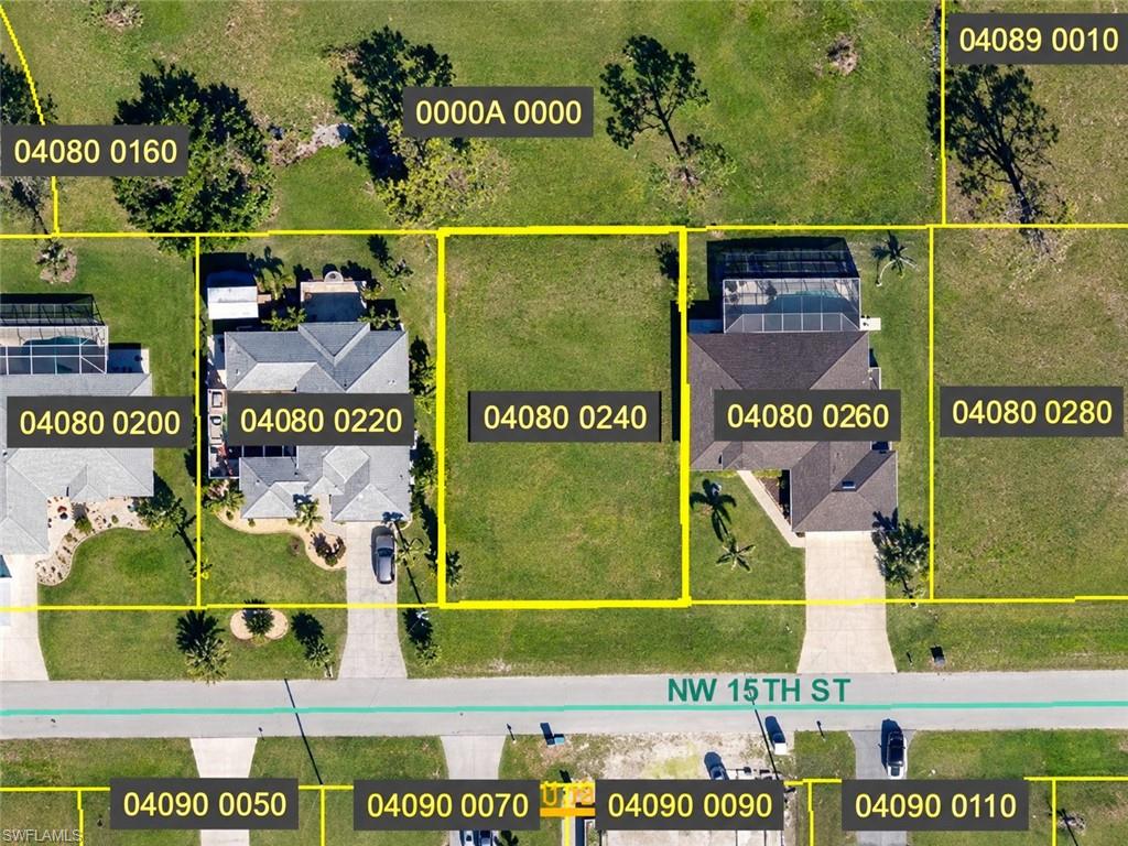EXCEPTIONAL OVERSIZED WATERFRONT LOT WITH BEAUTIFUL INTERSECTING CANAL VIEWS! Discover the perfect opportunity to build your dream home on this spacious 0.28-acre (12,240 sq. ft.) residential corner lot in the growing Northeast Cape Coral area. Ideally situated along a freshwater canal near the intersection of the Gator Slough and Albion canal waterways, this property offers beautiful water views, a peaceful setting, and desirable western exposure to enjoy spectacular Florida sunsets from your future lanai or pool area. Surrounded by a quiet residential neighborhood with newer homes being built nearby, this property combines tranquility with convenient access to shopping centers, restaurants, schools, and major roadways connecting Cape Coral to Fort Myers and Punta Gorda. Whether you're looking to build your Florida dream home or invest in a desirable waterfront property, this oversized homesite offers excellent possibilities. Don't miss this opportunity to own a beautiful waterfront lot in Southwest Florida!