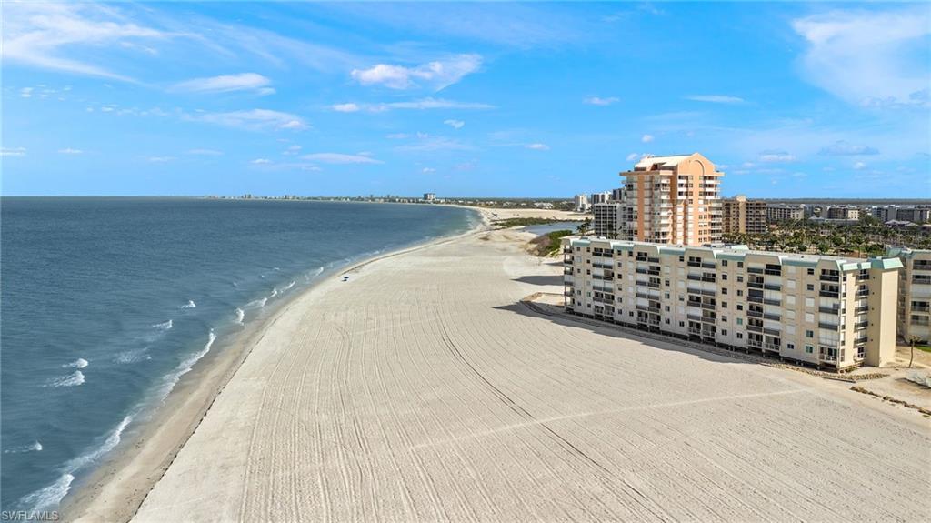DIRECT CONDO ON THE TOP FLOOR WITH SPECTACULAR GULF VIEWS. STEPS FROM THE WHITE SANDS AND GULF WATERS OF FT MYERS BEACH. This unit is direct gulf front on the 6th floor. Not a side view. The all-new sandy beach is absolutely spectacular. A 2 bedroom 2 bath condo on the top floor rarely comes on the market in this building. Amazing views from your open-air balcony with modern railing and tile floor. Perfect for watching sunrises and beautiful sunsets. All windows and doors are new hurricane-rated impact. This condo has had some nice updates. Spacious master bedroom overlooks the gulf. After a day at the beach, cool off in the resort sized pool. Assigned parking.