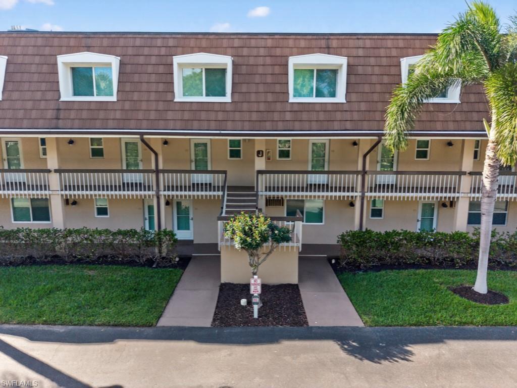 Paradise awaits in this beautiful 2 bedroom 1.5 bathroom town-home condo on Marco Island! This home is move-in ready with updates in the kitchen (stainless steel appliances and granite countertop) and bathrooms, wood-look tile floors downstairs, impact glass windows and sliders and tasteful furnishings. Enjoy views of the pool and a paved gathering area complete with chairs , tables and umbrellas from your private, screened balcony. Ideally located just one block from the stunning Residents' Beach and a short distance to several dining options, Island Manor offers its residents beautifully landscaped grounds, a large pool with a social room, shuffleboard courts, BBQ grills, assigned parking and extra storage, strong reserves, newer roof, siding, lanais and updated plumbing. Don't miss this opportunity to live the island lifestyle!