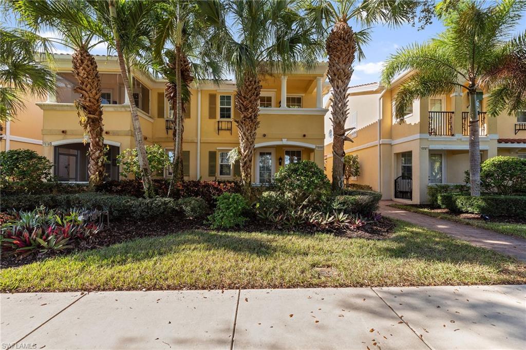 Beautiful 3-bedroom, 3-bath townhome located in the highly sought-after community of Village Walk of Bonita Springs. This home features wide lake views from your front patio and a thoughtfully designed, highly livable floor plan you’ll be proud to call home. This residence offers exceptional quality upgrades, including California Closets, built-in cabinetry with custom mirrors, and newer upgraded stainless steel appliances. A full bedroom and bath on the first floor with a walk-in closet provides the perfect space for guests, a home office, or multi-generational living. Each bedroom features its own private ensuite bath for maximum comfort and privacy. Enjoy the convenience of a 2-car garage, ample driveway and street parking, and a large private screened lanai with upgraded pavers—ideal for morning coffee or relaxing evenings. The mulched outdoor area is ready for customization with grass or landscaping for pets, plus there’s even a doggie door for added convenience for your furry family members. Village Walk is known for its low HOA fees  which include an incredible collection of resort-style amenities such as two swimming pools, an on-site café as well as a full service restaurant, post office, gas station, bank, fitness center, clay tennis courts, bocce ball courts, basketball courts, library, hair salon, and miles of scenic jogging and bike paths. Perfectly positioned east of downtown Bonita Springs, this community offers quick access to FGCU, Southwest Florida International Airport, premier shopping, fine dining, and the white sandy beaches of Bonita Springs and Fort Myers Beach. This is truly Florida living at its finest—schedule your private showing today!