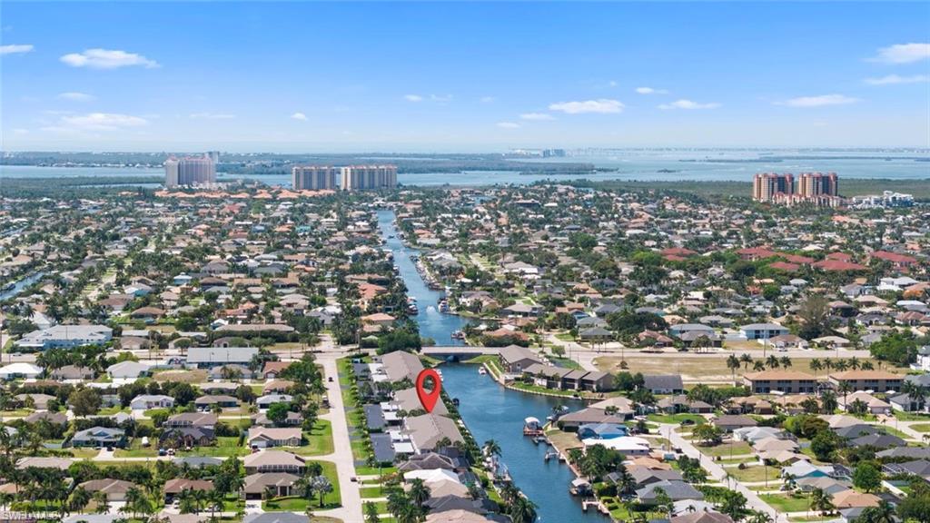 “GULF-ACCESS WATERFRONT CONDO w/ BOAT DOCK JUST STEPS FROM YOUR LANAI” …WELCOME to WATERFRONT LIVING at IT'S FINEST! This METICULOUSLY MAINTAINED 1st FLOOR CONDO at 4622 SW 12th Place offers the Perfect Blend of Comfort, Convenience, and Southwest Florida Lifestyle. Featuring “3” SPACIOUS BEDROOMS, 2 BATHS, and over 1,650 square feet of Living Space, this CANAL-FRONT Residence provides DIRECT GULF ACCESS with only a 40-minute Boat Ride to Open Water. Enjoy Relaxing Cruises to nearby favorites including Cape Coral Harbor and The Westin, both offering Exceptional Casual and Fine Dining just minutes away by boat. Inside, the Home Boasts an Open and Inviting Layout with Tile Flooring throughout the Main Living areas and Plush Carpeting in the “3” Bedrooms. The Oversized Owners Suite features Private Lanai Access, a Large Walk-in Closet, and Plenty of Natural Light. Double Sliding Glass Doors in the Living Room open Seamlessly to the Screened Lanai, creating the Perfect Indoor-Outdoor Florida Lifestyle. Plantation Shutters Accent the Kitchen and Guest Bedrooms, while the Lanai Storage Closet provides Convenient Additional Shelving and Storage Space. Some Furniture is also Negotiable, making this an Excellent Opportunity for Buyers seeking a Move-in Ready Florida Retreat. This condo has seen Major Upgrades including a New Dock after Hurricane Irma, a New Carport after Hurricane Ian, and a New Roof, offering Peace of Mind for years to come. Residents Enjoy a Beautifully Maintained Community Pool and Hot Tub with Sunny Western Exposure—Perfect for Capturing Breathtaking Sunsets. The monthly association fee of $585 includes Insurance, Irrigation Water, Grounds Maintenance, Exterior Pest Control, Sewer, Street Lighting, Trash Removal, and Water, making for truly Carefree Living. Whether you’re looking for a Year-round Residence, Seasonal Retreat, or Waterfront Investment, this Exceptional Gulf-access Condo delivers the Very Best of the Florida Boating Lifestyle.