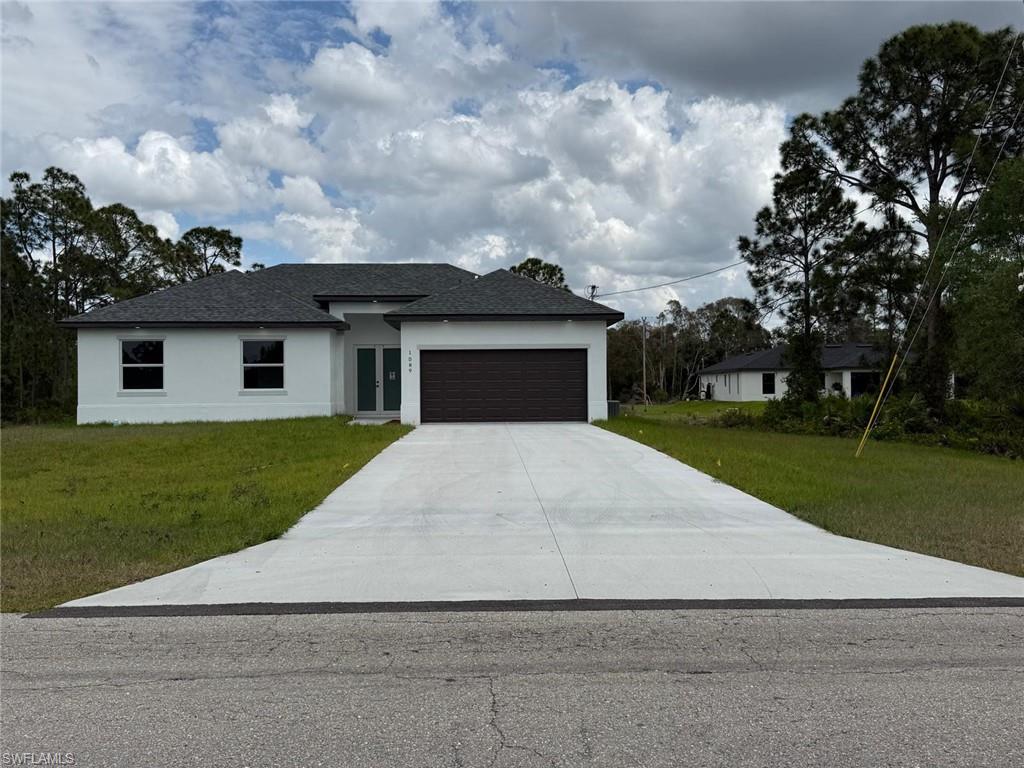 Brand New Construction in Lehigh Acres

Beautiful new construction featuring 3 bedrooms + den and 2 full bathrooms, designed with a bright open-concept layout and modern finishes throughout. Enjoy porcelain tile flooring, high ceilings, and a sleek kitchen with quartz countertops, large island, stainless steel appliances, and custom cabinetry.

The flexible den is perfect for a home office, guest room, or additional living space. Additional highlights include impact windows and doors, 2-car garage, and a dedicated laundry room. The primary bathroom offers a double vanity with contemporary design.

Located on a spacious lot in a growing area of Lehigh Acres, this home is ideal for both end-users and investors, offering strong rental potential and long-term value.