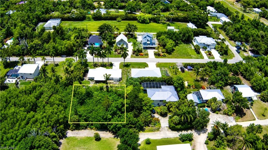 Build your dream home in the charming island community of Bokeelia, located on beautiful Pine Island, Southwest Florida's largest island and one of its best-kept secrets. This vacant homesite offers the opportunity to enjoy a relaxed Old Florida lifestyle surrounded by natural beauty, world-class fishing, boating, kayaking, and breathtaking sunsets. Conveniently located near marinas, waterfront restaurants, parks, and some of the area's most scenic waterways, this property provides the perfect setting for a full-time residence, seasonal getaway, or investment opportunity. Enjoy the peaceful atmosphere of island living while remaining within reach of Cape Coral, Fort Myers, and the Gulf beaches. Don't miss your chance to own a piece of paradise in one of Southwest Florida's most unique and sought-after coastal communities.