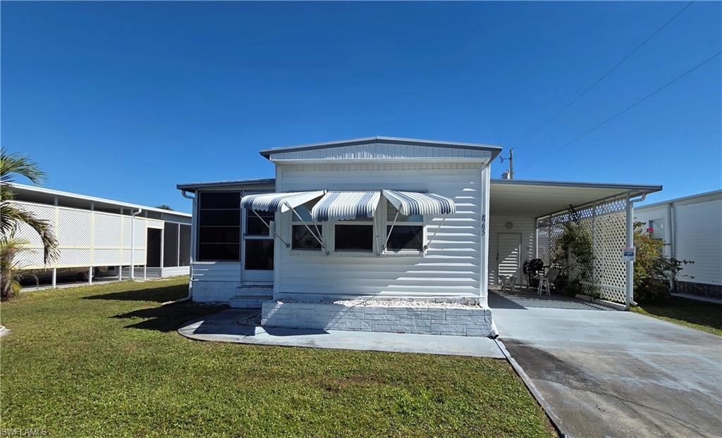MASSIVE PRICE REDUCTION on the BEST VALUE IN LAZY DAYS MOBILE VILLAGE! Immaculate and lovingly maintained home with a spacious, sunny Florida room in front, and a nice open air patio in back is ideally located on a quiet street with no through traffic. FULLY FURNISHED TURNKEY, this well-kept residence is ready for you to move in TODAY! You’ll love the Bright & cheerful Eat-in Kitchen with new stove, refrigerator, and a lovely bay window. Floors are solid throughout with plywood underlayment. Bathroom features a shower/tub combination. Washer (no dryer)and full-size water heater are conveniently located in the breezeway shed. Seller just renewed insurance coverage and has a current 4-point inspection on file. Own your land AND this home - where no pets or smokers have lived. Enjoy MAINTENANCE-FREE AFFORDABLE LIVING in the Sunshine State! HOA fee is only $185/month and covers recreation facilities, common grounds maintenance, and trash collection. Walk to the pool & enjoy a people-friendly, pet-friendly 55+ Community with two clubhouses, heated community swimming pool, shuffleboard, ponds, parks, nice landscaping, streetlights, monthly newsletter & year ‘round activities. Low-cost RV & boat storage on-site. Life is good at Lazy Days! A great place to live year-round or as a warm weather getaway. Park share certificate is available separately at a price to be negotiated between the buyer and seller. Share ownership reduces the monthly fee significantly. You own the land in Lazy Days whether or not you own a share. This lovely home is offered fully furnished TURN-Key. No storm damage. PUT THIS ONE AT THE TOP OF YOUR LIST! CASH ONLY