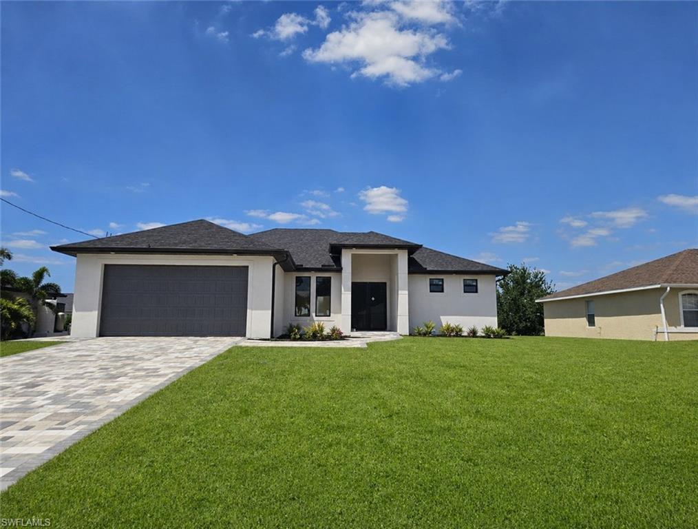 This upcoming new construction at 2511 NW 7th Street, Cape Coral offers a balanced and spacious layout designed for modern living. According to the architectural plans, this 1,606 sq. ft. air-conditioned home features a functional 3-bedroom plus office configuration, perfect for families or those needing a dedicated workspace.  
Total Living Space: 1,606 sq. ft. of air-conditioned living area.  
Total Area Under Roof: 2,350 sq. ft., which includes the garage, entry, and lanai.  
Bedrooms & Office: 3 comfortable bedrooms plus a dedicated office space with 10' flat ceilings.  
Great Room: A central gathering area featuring elegant coffer ceilings.  
Outdoor Living: A 197 sq. ft. enclosed lanai for year-round enjoyment of the Florida climate.  
Garage: A generous 474 sq. ft. two-car garage.