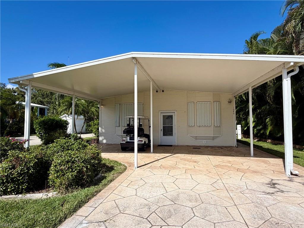 Off-lake manufactured home built in 1997.  One of very few homes available in Silver Lakes with a car port   The floor plan includes two bedrooms + den with 1/2 bathroom, and one full bathroom with stand-alone shower.  This unit has a great amount of space to customize rooms to your liking.  The outside screened in lanai is private backing up to the serene preserve.
