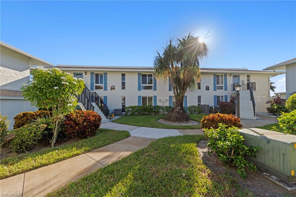 SPECTACULAR GOLF COURSE AND WATER VIEWS! Enjoy the best of Florida living in this beautifully renovated first-floor condo offering 1,215 sq. ft. of living space with a desirable split-bedroom floor plan. The updated kitchen and newer bathrooms provide modern comfort and style, while the spacious glass-enclosed and screened lanai is the perfect place to relax and take in the breathtaking views of the 12th fairway and water feature of the Pines Golf Course. Set back from the road, this condo offers a wonderful sense of privacy and tranquility, with spectacular views from the rear of the residence.

Located in The Glades Golf & Country Club, where golf is bundled with ownership, residents enjoy two golf courses, the Pines par 70 and Palmetto par 55, 12 pickleball courts, Har-Tru tennis courts, bocce, shuffleboard, nine swimming pools, a clubhouse, the 19th Hole Restaurant, and a full calendar of social activities. All of this is just minutes from downtown Naples, Fifth Avenue South, fabulous restaurants, shopping, and Naples' beautiful Gulf beaches. Whether you're looking for a seasonal retreat or a year-round residence, this condo offers the perfect combination of privacy, beautiful views, and an exceptional Naples lifestyle!