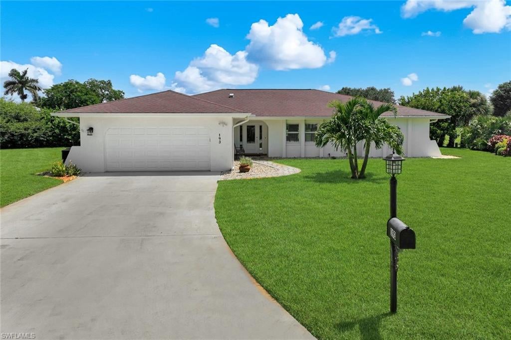 Welcome to 193 Heather Grove Ln, a beautifully renovated Naples residence where thoughtful upgrades, modern finishes, and exceptional outdoor living come together on an oversized 0.35-acre pie-shaped cul-de-sac lot. Extensively renovated in 2023, this home offers a move-in-ready lifestyle with quality improvements throughout.
Inside, natural wood flooring and new baseboards create a warm, cohesive feel, complemented by solid-core interior doors and plantation shutters throughout. The updated kitchen is the heart of the home, featuring new cabinetry, quartz countertops, a large island with abundant additional storage, new sink and backsplash, upgraded lighting, and an LG ThinQ appliance package with a desirable induction cooktop. The custom-built entertainment area, complete with a beverage refrigerator, is ideal for both everyday living and entertaining.
The spacious primary suite features a beautifully updated bathroom with quartz counters, a frameless shower door, and newly retiled shower and flooring. Custom closet build-outs provide exceptional organization, while the updated guest bedrooms offer comfortable accommodations for family and visitors.
Major system and structural improvements include a newer electrical panel, whole-house PEX re-plumbing, full impact glass windows and doors, new gutters, and a replaced exterior AC compressor motor. The 2023 washer and dryer and epoxy-coated garage floor add even more convenience and functionality.
Step outside to your private backyard retreat, where the pool area has been refreshed with all-new pavers, new sod, automatic screens, and a four-zone sprinkler system. With an oversized pie-shaped lot at the end of a cul-de-sac backing up to a golf course, there is plenty of room to enjoy the outdoor space and the privacy this exceptional homesite provides.
With extensive 2023 renovations, impact protection, a beautifully updated interior, and a generous cul-de-sac lot, 193 Heather Grove Ln offers the ideal combination of style, comfort, and peace of mind in Naples.