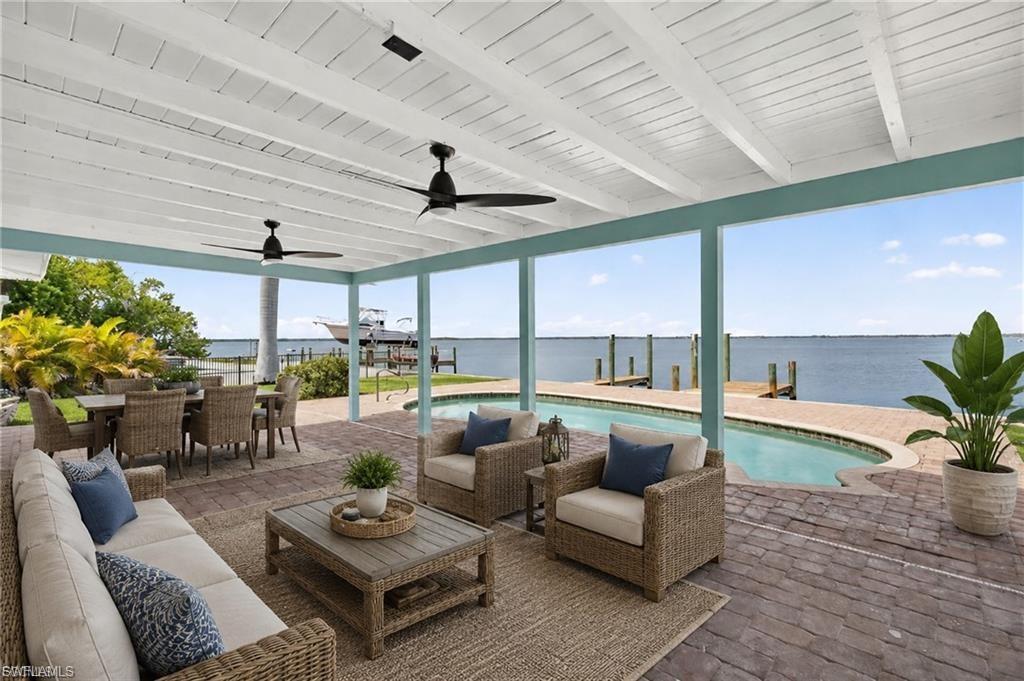 Owner Financing Available!!! Waterfront Paradise with Spectacular Back Bay Views located on Fort Myers Beach....Experience the ultimate Southwest Florida lifestyle in this beautifully renovated 3-bedroom, 2-bath waterfront residence, perfectly positioned on one of the most sought-after lots on Fort Myers Beach. Offering panoramic Back Bay views and an unparalleled setting, this exceptional property presents a rare opportunity to own a true piece of paradise. Wake up each morning to breathtaking sunrises reflecting across the water and spend your days relaxing by the private pool while enjoying the tranquil beauty of the bay. The home’s open and inviting layout is designed to maximize the stunning views, creating a seamless connection between indoor and outdoor living. Completely updated and move-in ready, this residence combines modern comfort with a premier waterfront location. Whether you’re entertaining guests, boating nearby waters, going to the beach or simply taking in the spectacular scenery from your backyard, every day feels like a vacation.