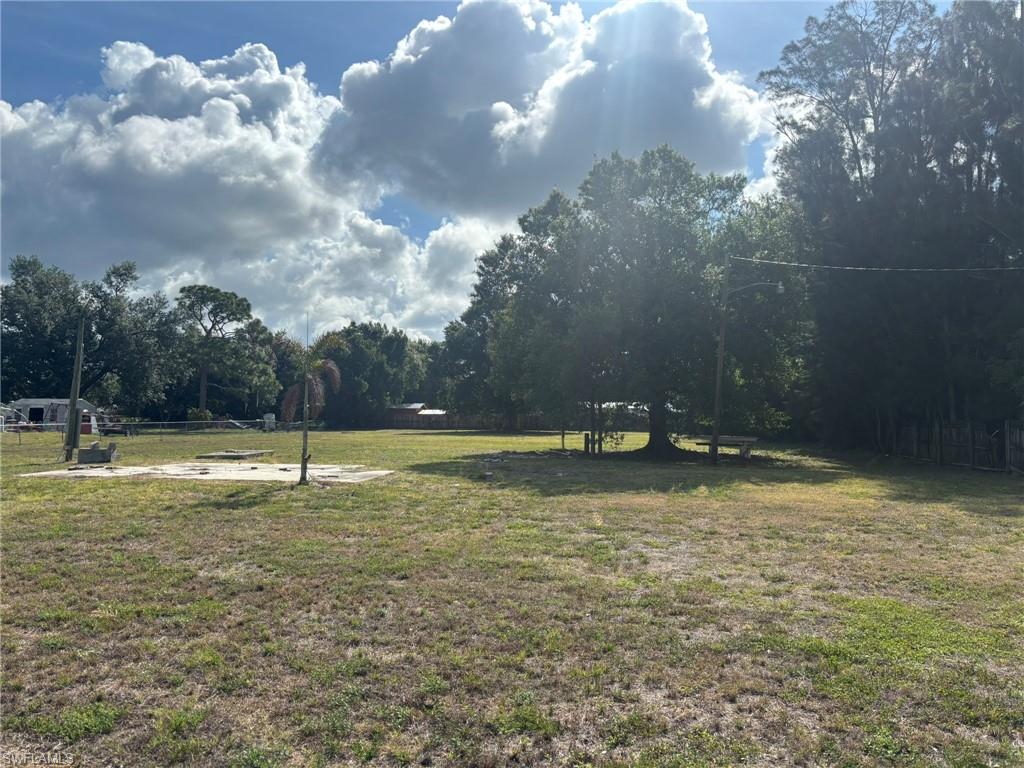 1 acre lot in Suncoast estates.  Lot previously had a mobile home on it and has septic and water.  Buyer to check the Septic as seller has never lived on property and does not know state of septic.  City water and electricity.  Agent has interest in property.