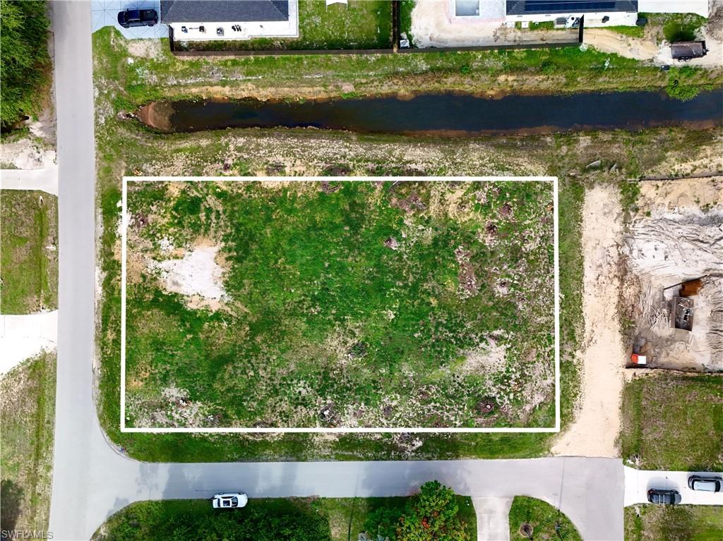 Prime residential lot opportunity in Lehigh Acres, Lee County (ZIP: 33971). 

Situated in a desirable residential area, this property offers convenient access to The Shoppes at Lehigh (0.96 miles), Westminster Tot Lot (0.81 miles), Gateway High School (1.89 miles), Grace Community School (1.96 miles), a local hospital (1.77 miles), and major highways (approximately 2.0 miles). The lot is located in Flood Zone X, indicating minimal flood hazard outside both the 100-year and 500-year floodplains. No wetlands are present or nearby, allowing for full lot utilization without environmental permits, impact studies, or mitigation measures. 

Zoned RS-1 (Single-Family Residential), the property supports single-family detached homes (site-built and modular if code-compliant) by right. Mobile/manufactured homes, duplexes, townhomes, multifamily apartments are generally prohibited. ADUs may need approval. Typical density 1-3 units/acre. The Florida Live Local Act may allow overrides in some cases. This is informational only - zoning can change. Buyer should request an official Zoning Verification Letter from Lee County Community Development Department and verify all zoning, setbacks, utility availability, and development requirements. 

The property is available for a self-guided tour. Subleasing is not permitted. This lot is not available for rent or lease.