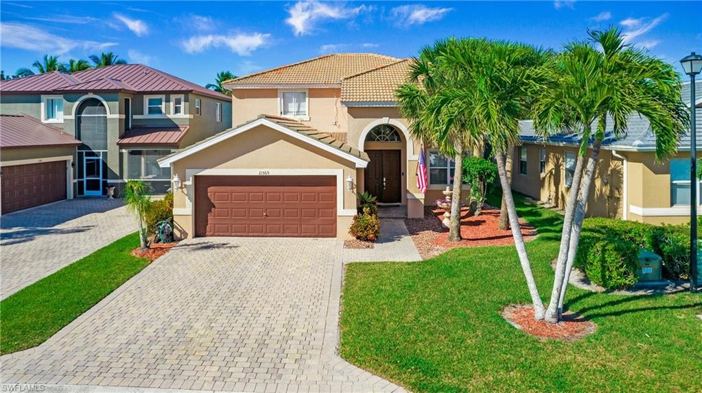 LAKEFRONT HOME in Plantation Preserve – A RARE VALUE-ADD OPPORTUNITY!
Freshly painted + NEW second-floor bedroom flooring already completed!

Calling all investors, flippers, handy buyers, and value-seekers—this is the opportunity you’ve been waiting for! Step into this SPACIOUS 4-BEDROOM, 2.5-BATH LAKEFRONT HOME in the highly desirable gated community of Plantation Preserve and unlock instant equity potential with a little TLC.

From the paver driveway to the lush tropical landscaping, the curb appeal is already here—now bring your vision to elevate this home to its full potential! Inside, you’ll find soaring ceilings, abundant natural light, and a versatile upstairs loft with breathtaking lake views—perfect for reimagining as a home office, media room, or additional living space.

The renovated kitchen features white cabinetry, granite countertops, and stainless steel appliances—great bones that allow you to focus your improvements where they matter most. The open-concept great room flows seamlessly to the outdoor living area, offering tranquil water views and endless possibilities for future upgrades.

The spacious primary suite delivers serene lake vistas and a spa-style ensuite layout ready for your personal touches. Step outside to the screened lanai and envision the oasis you could create—there’s even room to add a private pool for major resale value.

With some cosmetic updates and design enhancements, this home can transform into a high-value lakefront showpiece. Whether you're looking for your next flip, rental investment, or long-term equity opportunity, this property checks every box.  

Located minutes from Daniels Corridor, US-41, I-75, RSW Airport, shopping, dining, and the Gulf beaches—this is the perfect location + potential combo.

HURRY—opportunities like this don’t last.
Schedule your private showing today and bring your best offer!
BRING IN THE OFFERS!!!