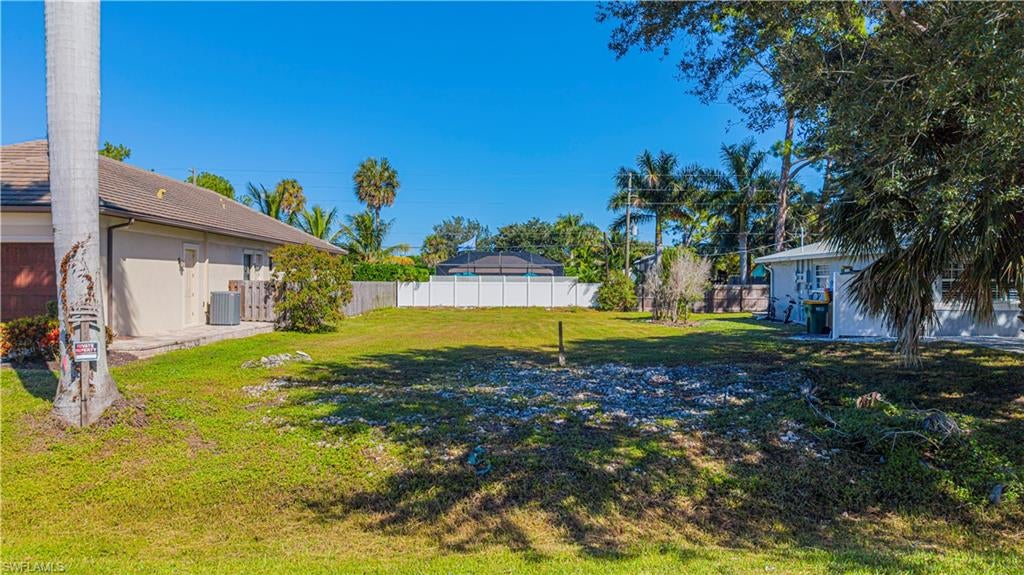 Here's your opportunity to own a 50' x 135' vacant residential lot in the highly desirable Naples Park community with freedom to select your own builder. Nice quiet street just 2 miles from the white sands of Vanderbilt Beach, Mercato shopping, dining and entertainment complex
North Collier Regional Park is nearby, with miles of scenic nature trails, baseball and soccer facilities, a water park.Also nearby is  Veterans Community Park, offering pickleball, tennis, bocce, racquetball, and a dog park. Whether you've been dreaming of a custom home, a seasonal retreat, or an income-producing vacation rental -this is your chance. City water and sewer are available, and no flood insurance is required due to elevation rating. Don't miss this opportunity -a new home is being built right across the street!