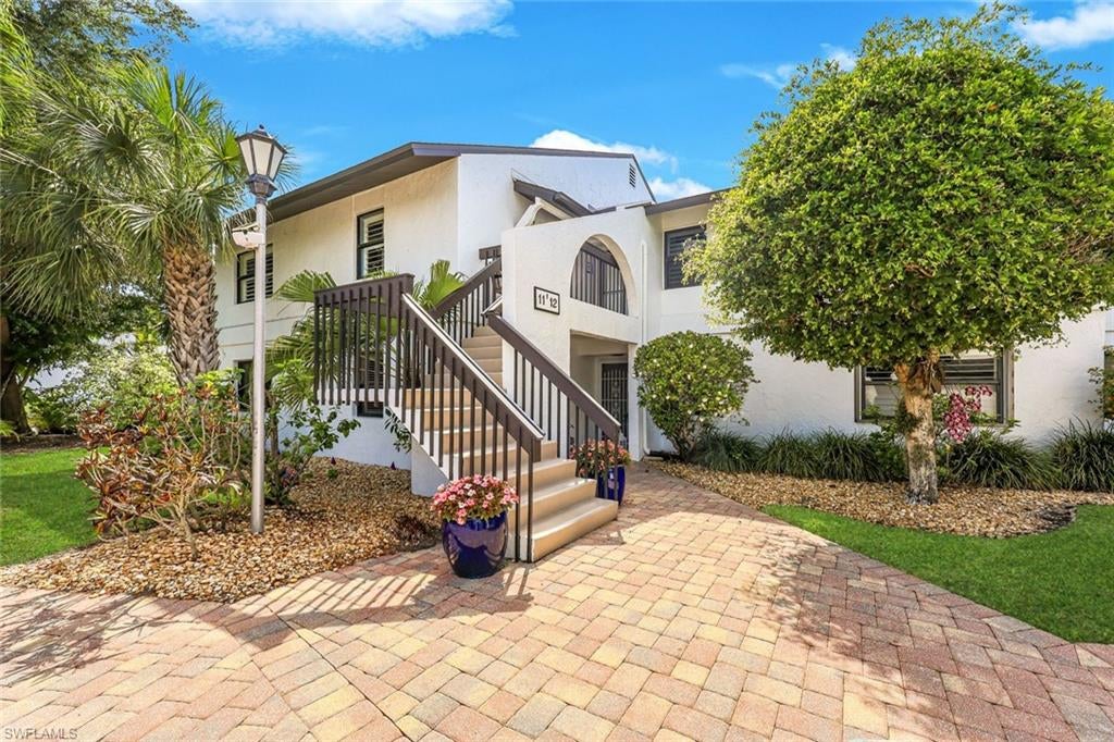 Everything about this Park Shore condo is inviting with a seamless blend of Olde Florida charm and completely renovated modern features. This second floor 2 Bedroom/2 Bath home features a main en-suite bedroom with a King bed and a second flex bedroom/den with a Murphy bed. Beautifully decorated and furnished, every room is filled with natural light, warm tones, and a sense of calm. The comfortable screened lanai provides the perfect spot for reading, relaxing, or just enjoying the peaceful surrounding green space. There is a covered car port for your vehicle and a sun-drenched Community pool with grill area for your daily enjoyment. Very close to Publix, shopping and restaurants.